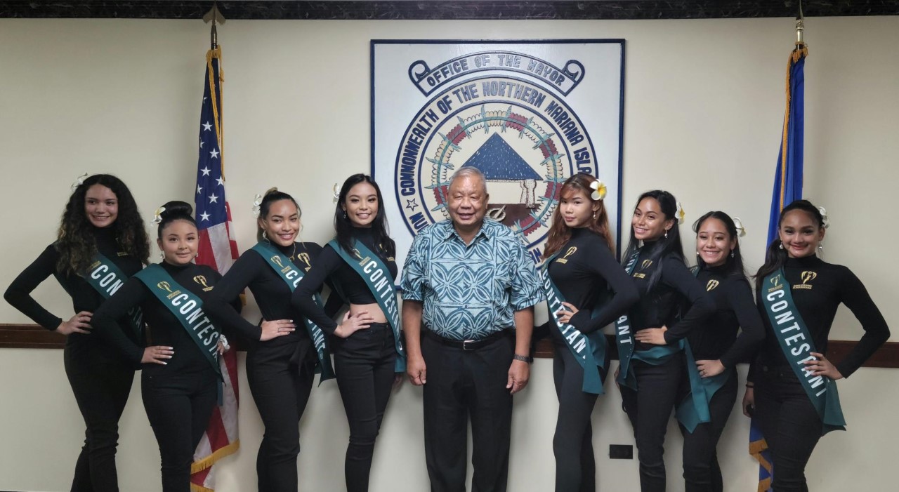 The Miss NMI Earth 2021 contestants pose for a photo with Saipan Mayor David M. Apatang.