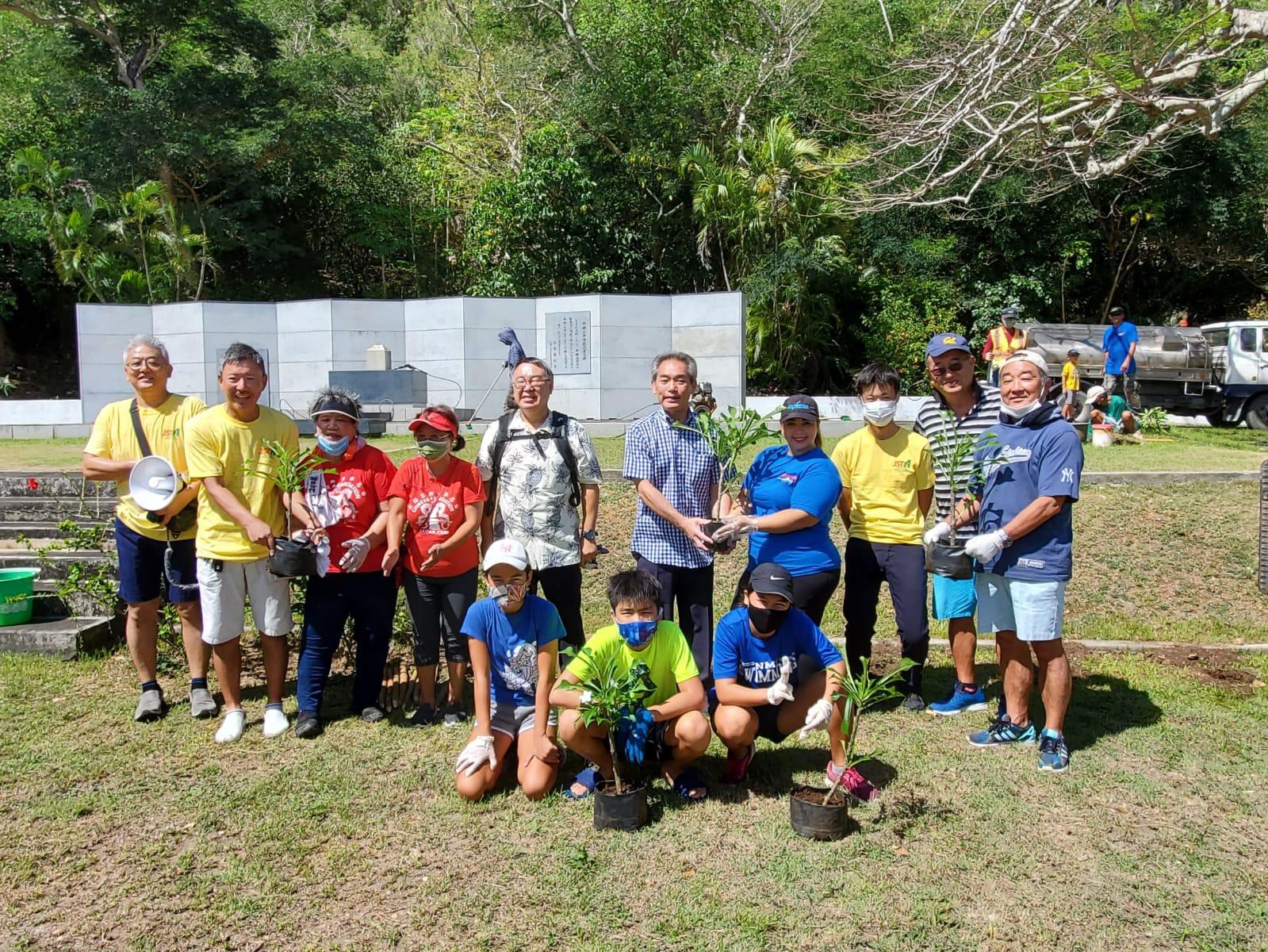 Representatives of the Marianas Visitors Authority, Japan Saipan Travel Association, Korea Tourism Association, Chinese Association and Japanese Society School of Saipan prepare to plant trees during the tourism industry cleanup on May 29, 2021 in Marpi, Saipan.