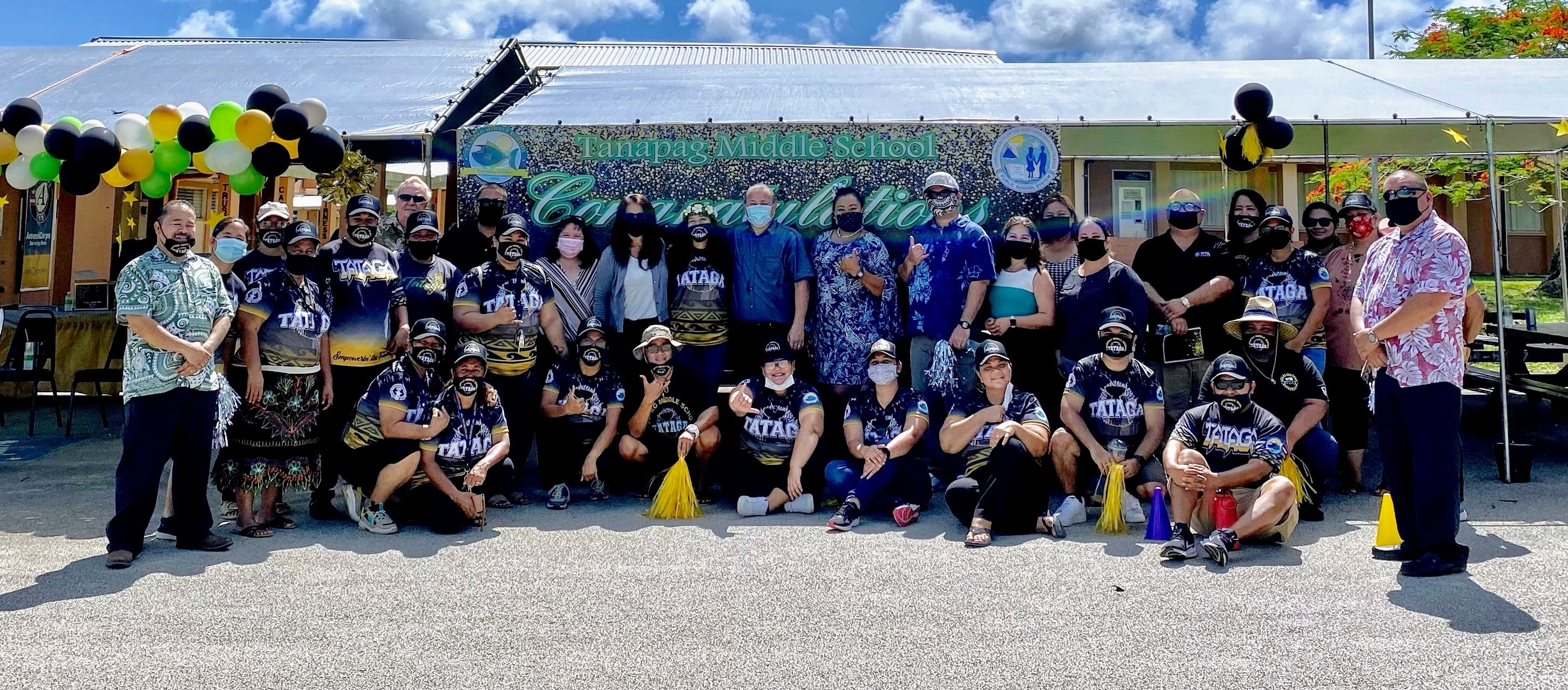 PSS and BOE officials join the Tanapag Middle School family for a group photo after yet another successful school year.