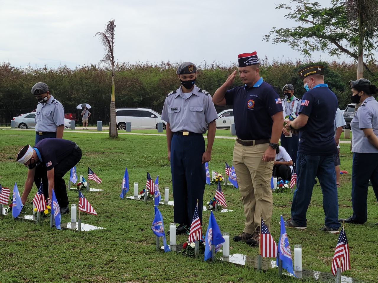 VFW District VI commander Brad Ruszala salutes a fallen servicemember.