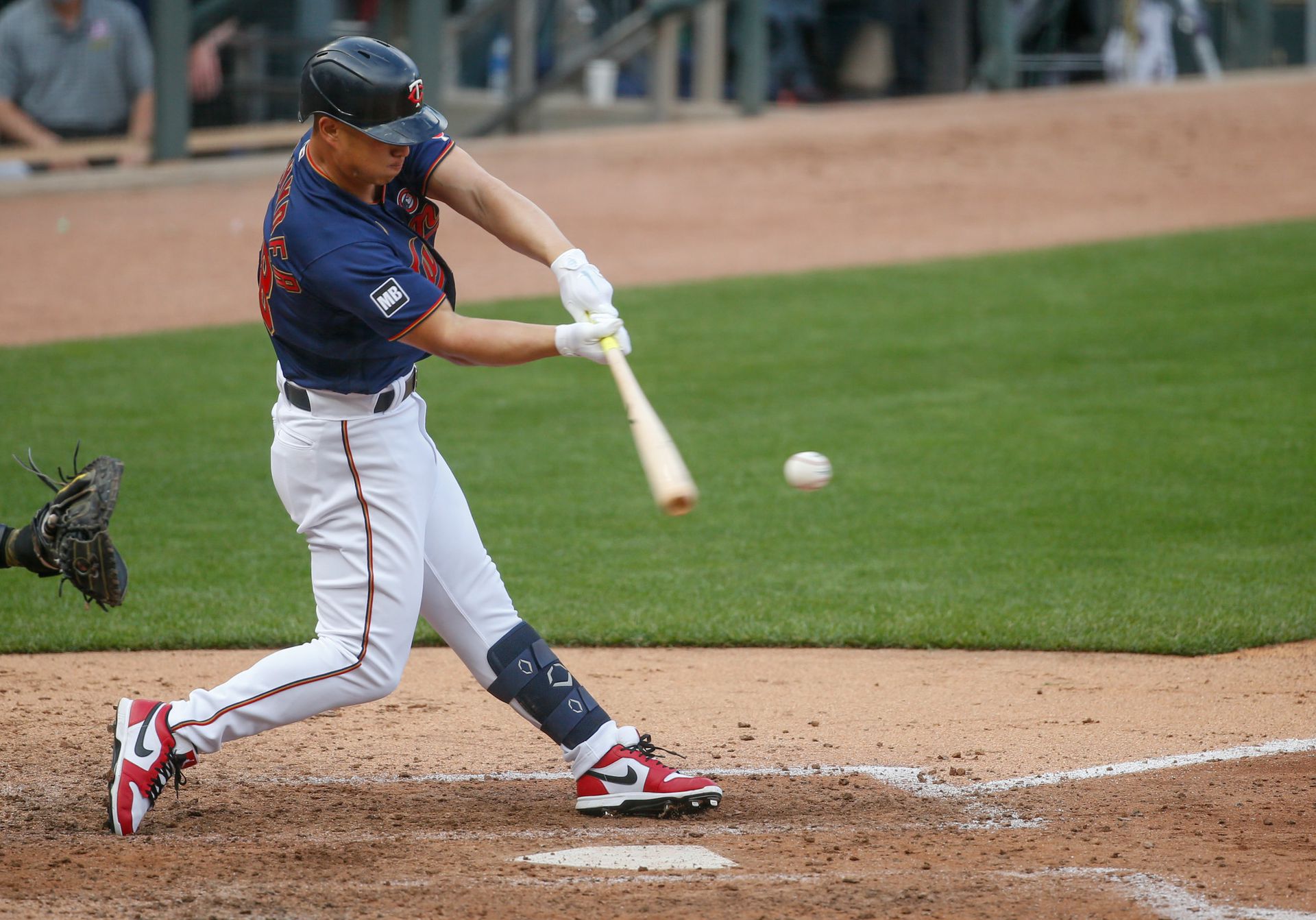 Minnesota Twins left fielder Rob Refsnyder (38) bats against the Oakland Athletics at Target Field  in Minneapolis, Minnesota on May 15, 2021.