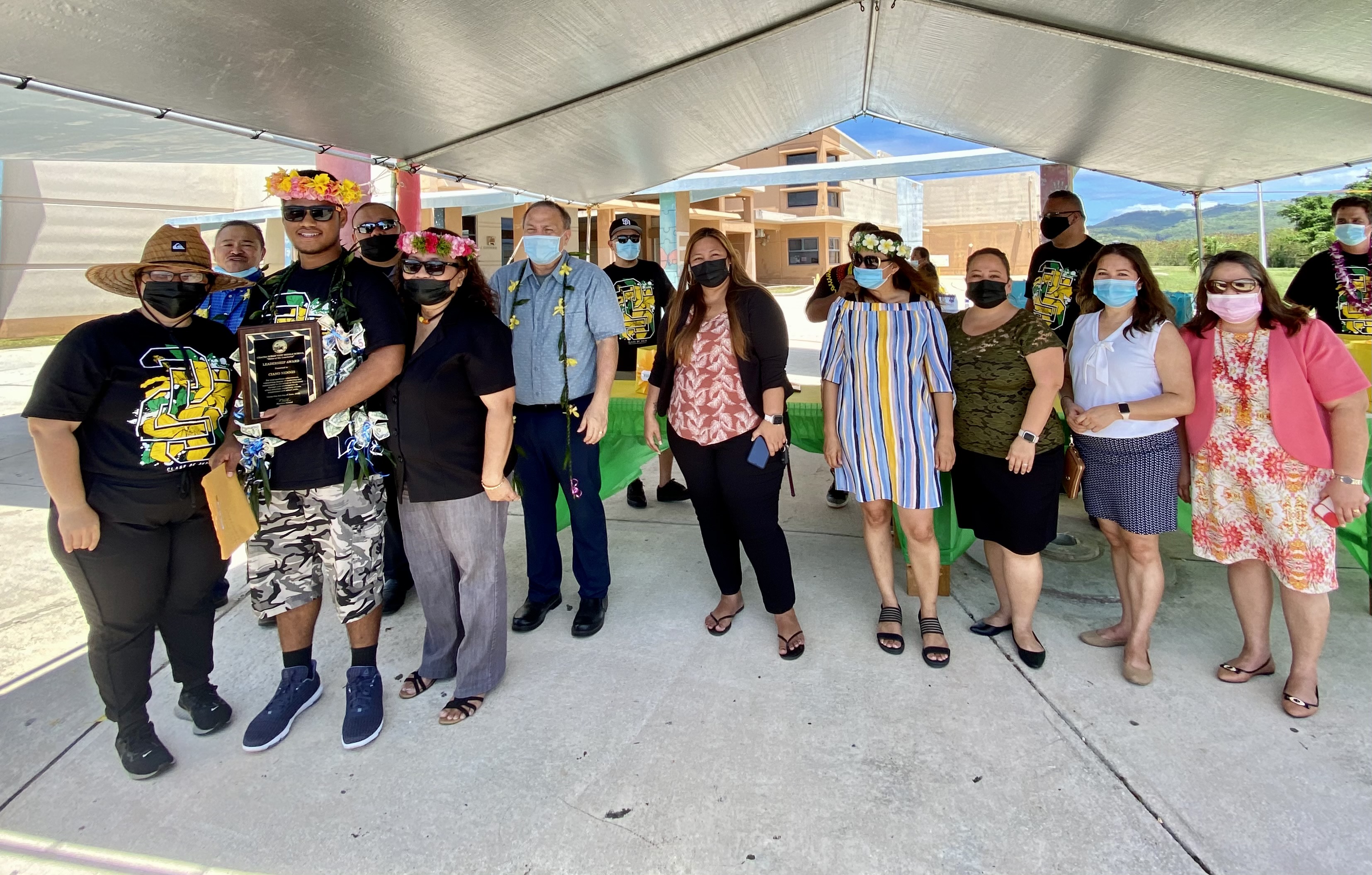 Cianno Nennis receives the Oceanview Middle School Leadership Award from principal Martha Kintol and vice principal Leah Murphy.
