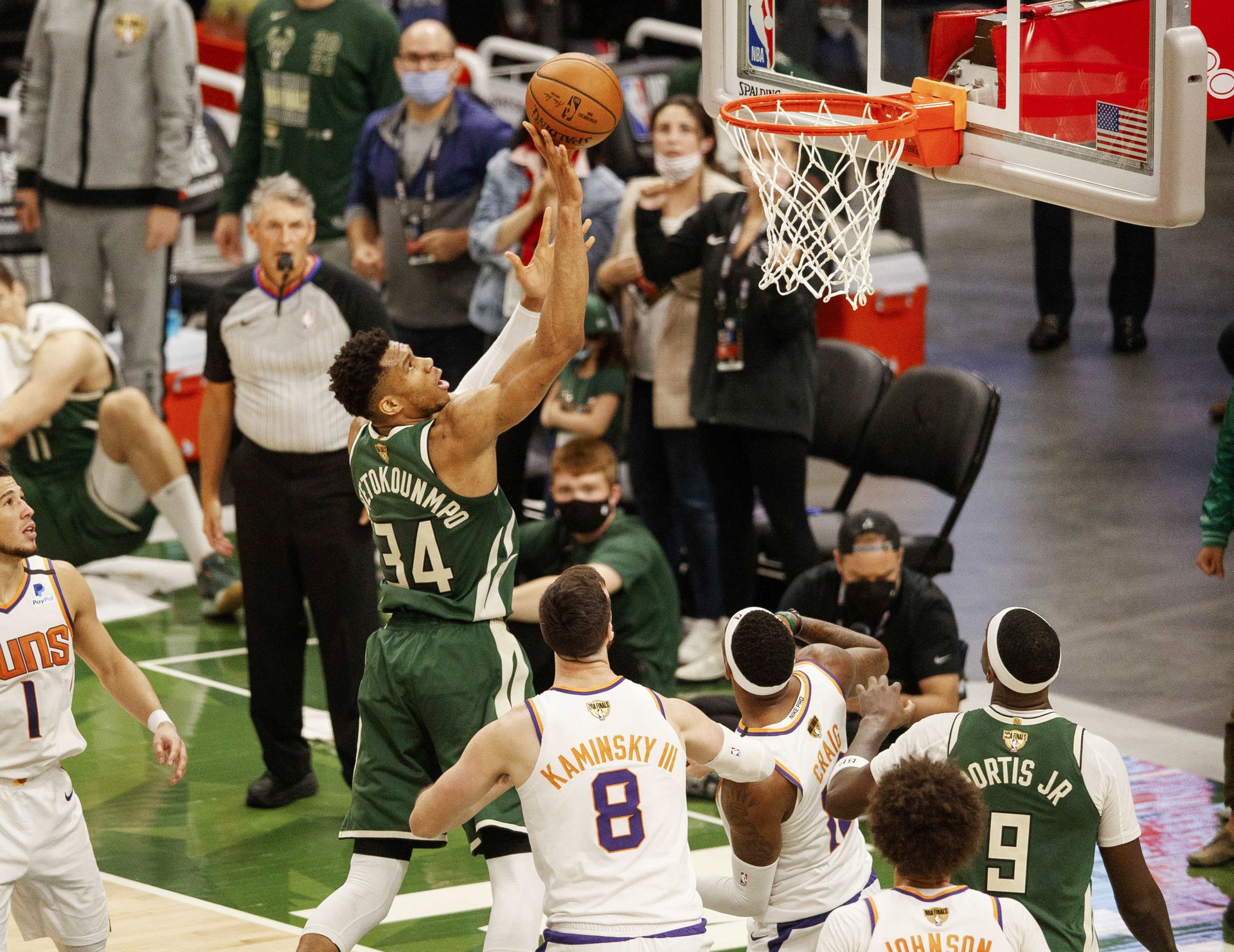 Milwaukee Bucks forward Giannis Antetokounmpo (34) shoots during the fourth quarter against the Phoenix Suns during game three of the 2021 NBA Finals at Fiserv Forum in Milwaukee, Wisconsin on July 11, 2021.