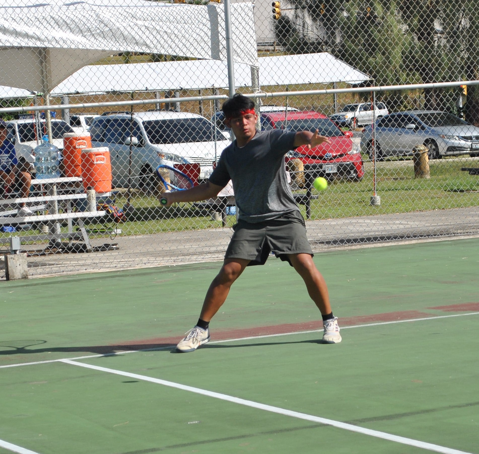 Morris Villanueva winds up for the return.