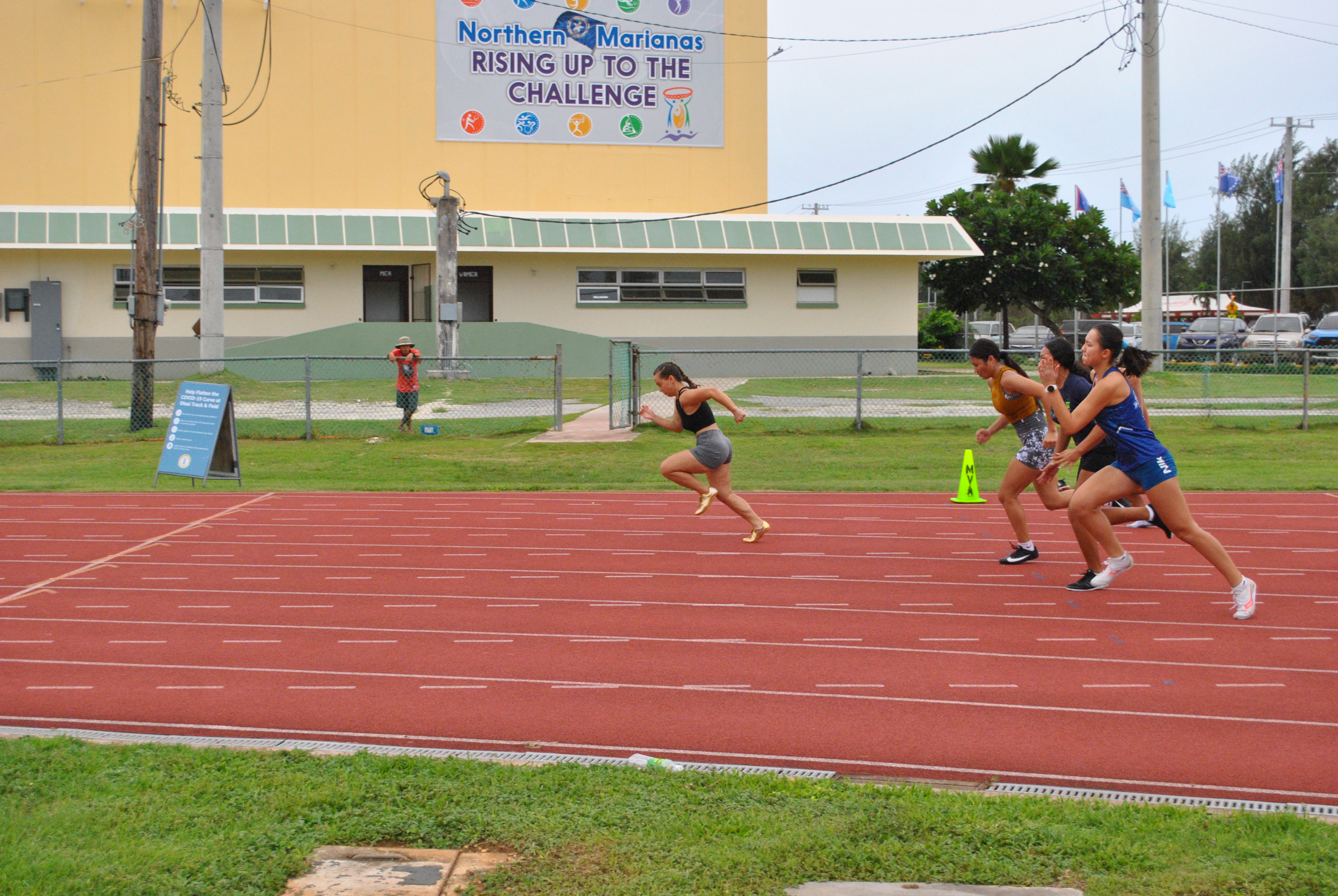 Filomenaleonisa Iakopo breaks away from rest of the 100m participants during the Northern Marianas Athletics Open Track & Field second meet on Saturday at the Oleai Sports Complex.