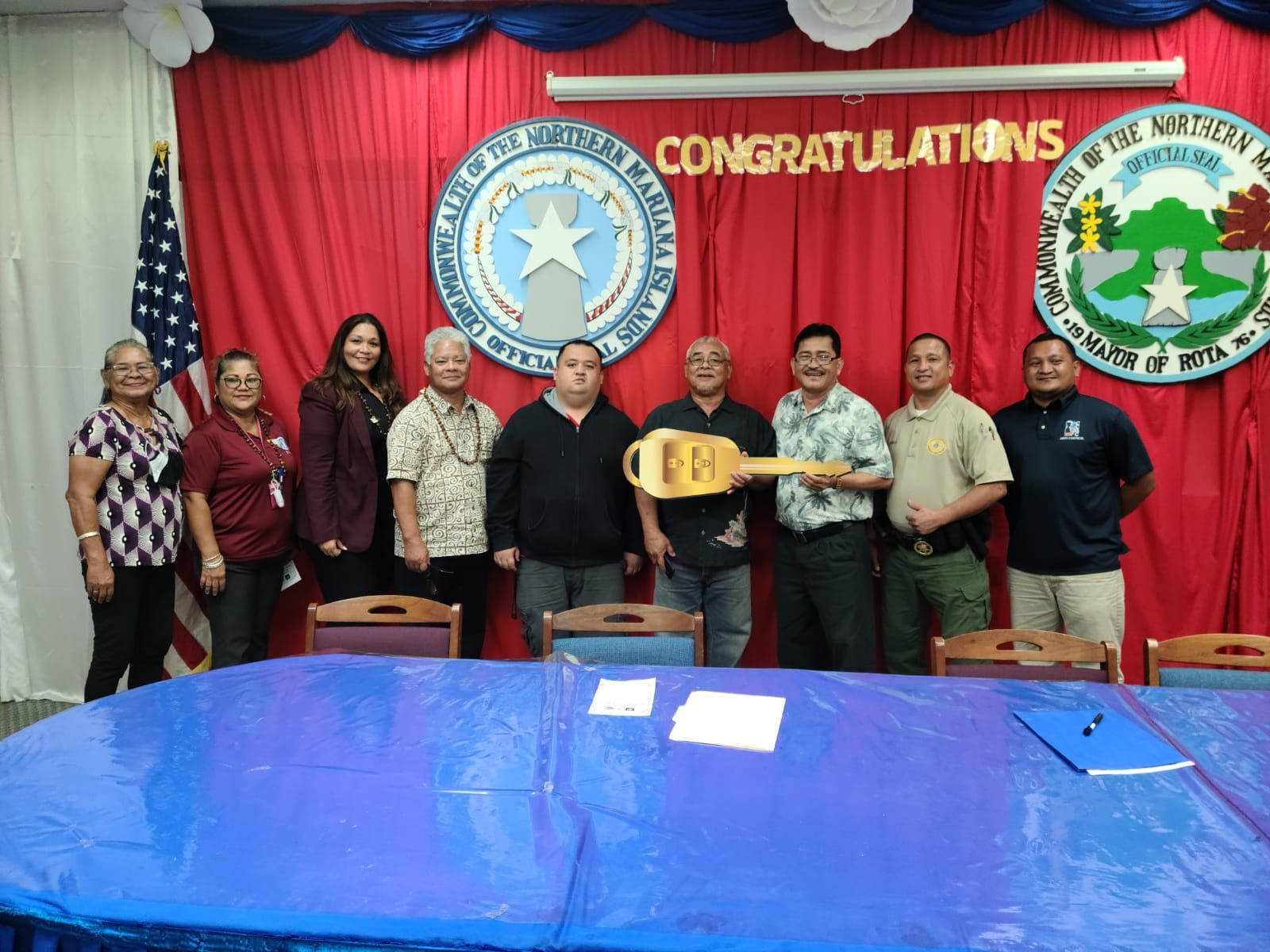 Acting Gov. Arnold I. Palacios, Mayor Efraim M. Atalig, Special Assistant for Public Transportation Alfreda C. Maratita, members of the Rota Mayor's staff, Rota disability network partners pose for a photo during the official key turnover ceremony at the Rota Mayor's Office.