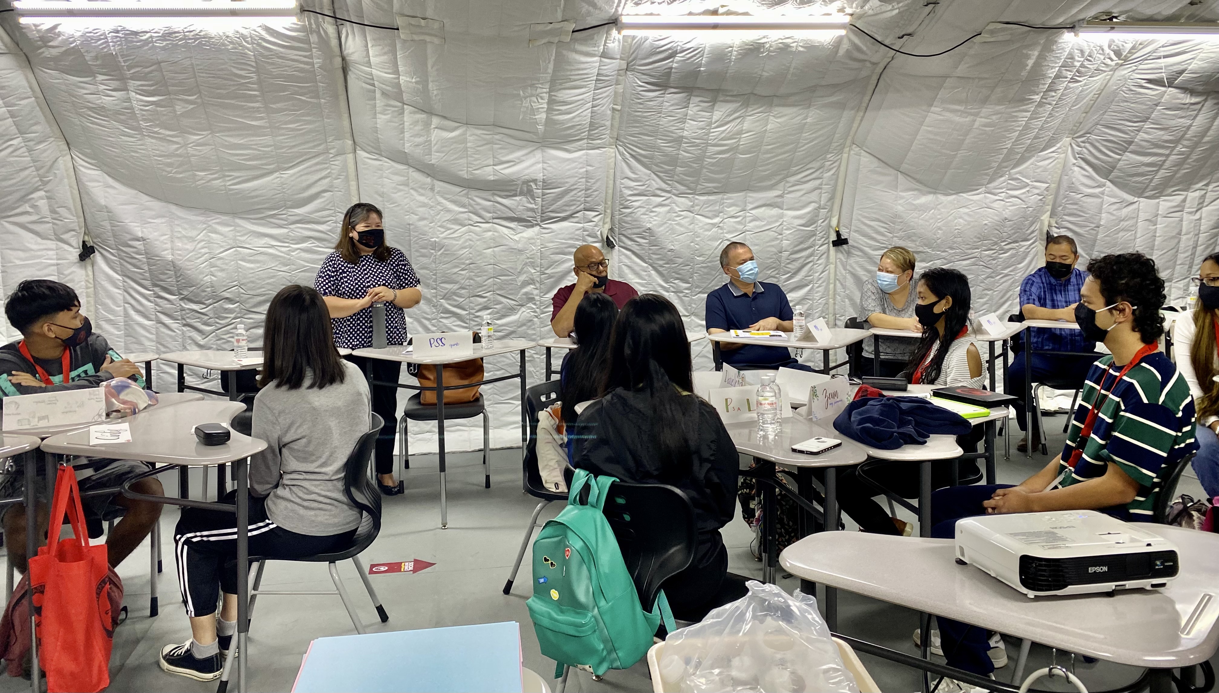 Public School System  Accountability, Research and Evaluation Senior Director Dr. Rizalina Liwag talks to the students.