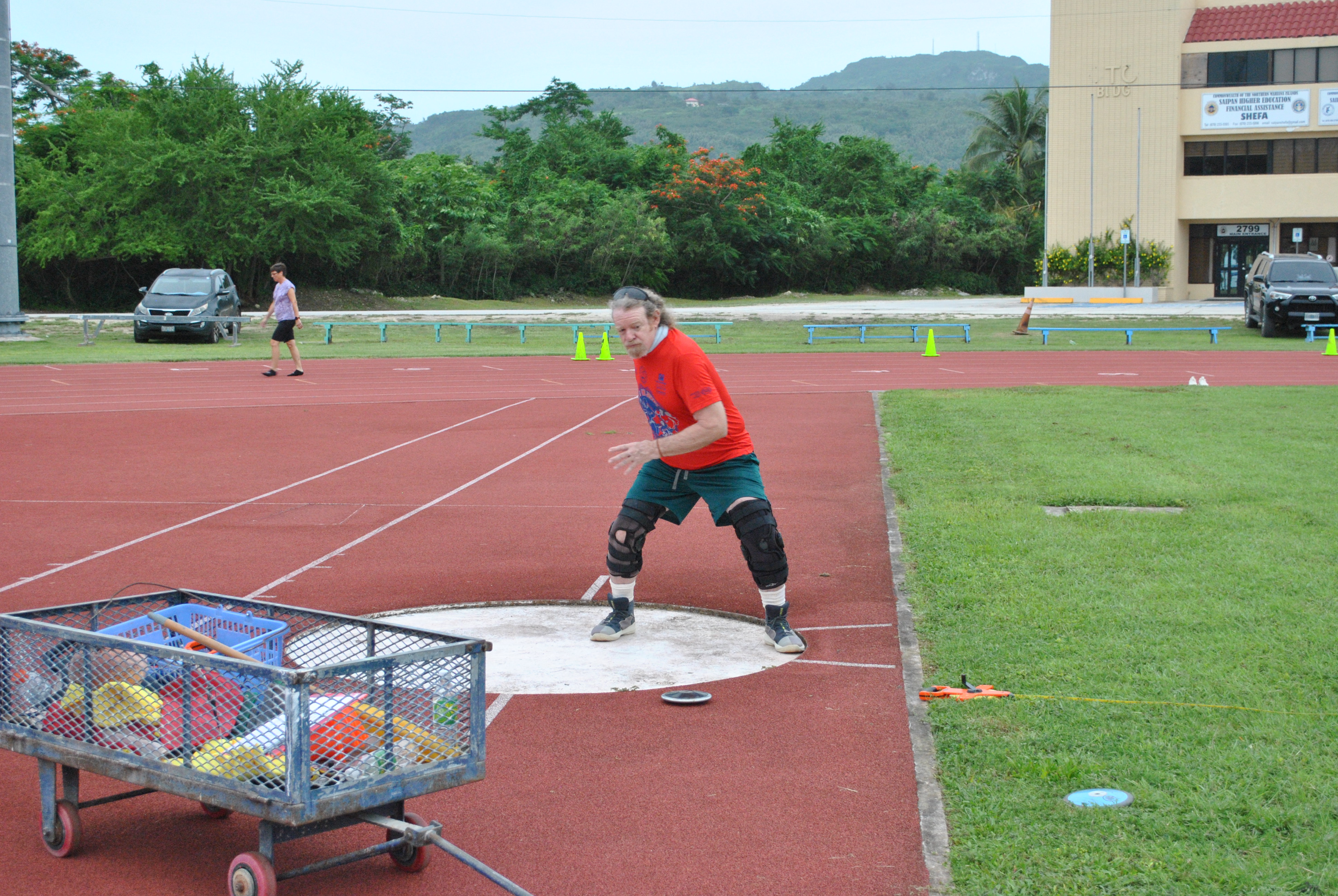 Chas Algaier winds up for the discuss throw during the Northern Marianas Athletics Open Track & Field second meet on Saturday at the Oleai Sports Complex.