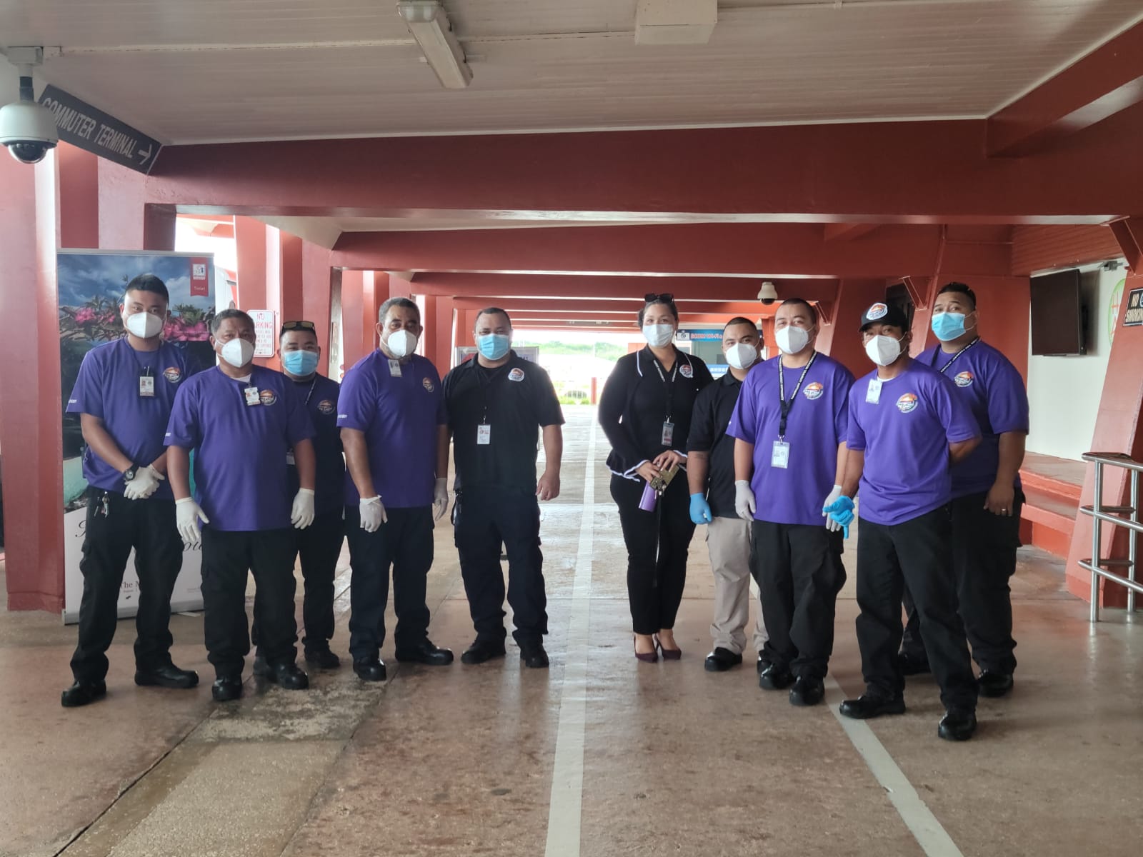 Commonwealth Office of Transit Authority personnel led by Special Assistant for Public Transportation Alfreda Camacho wait for the arrival of the tourists who will be transported to PIC by COTA.