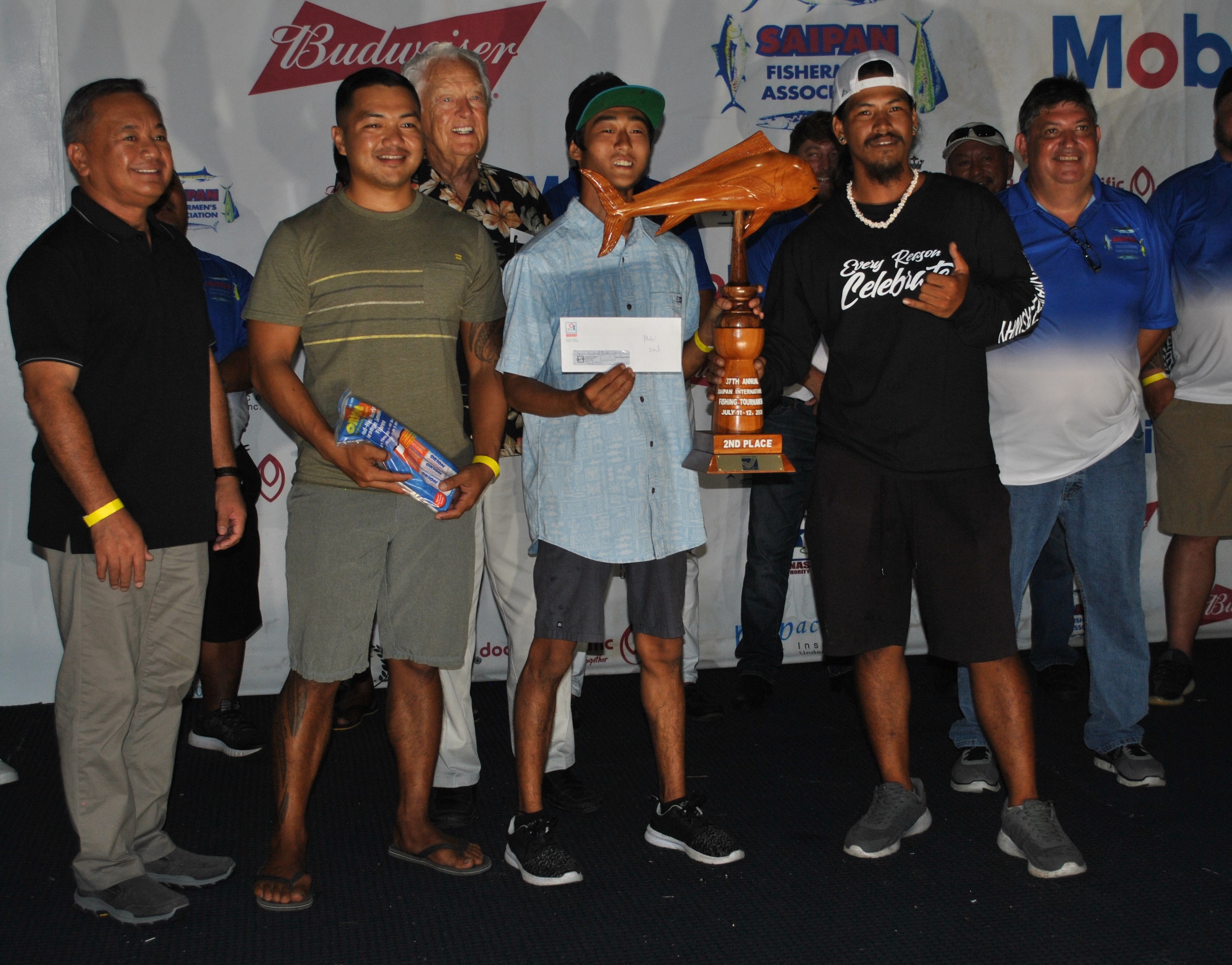 The Salty Bandits pose with their 2nd place Mahi Mahi trophy.