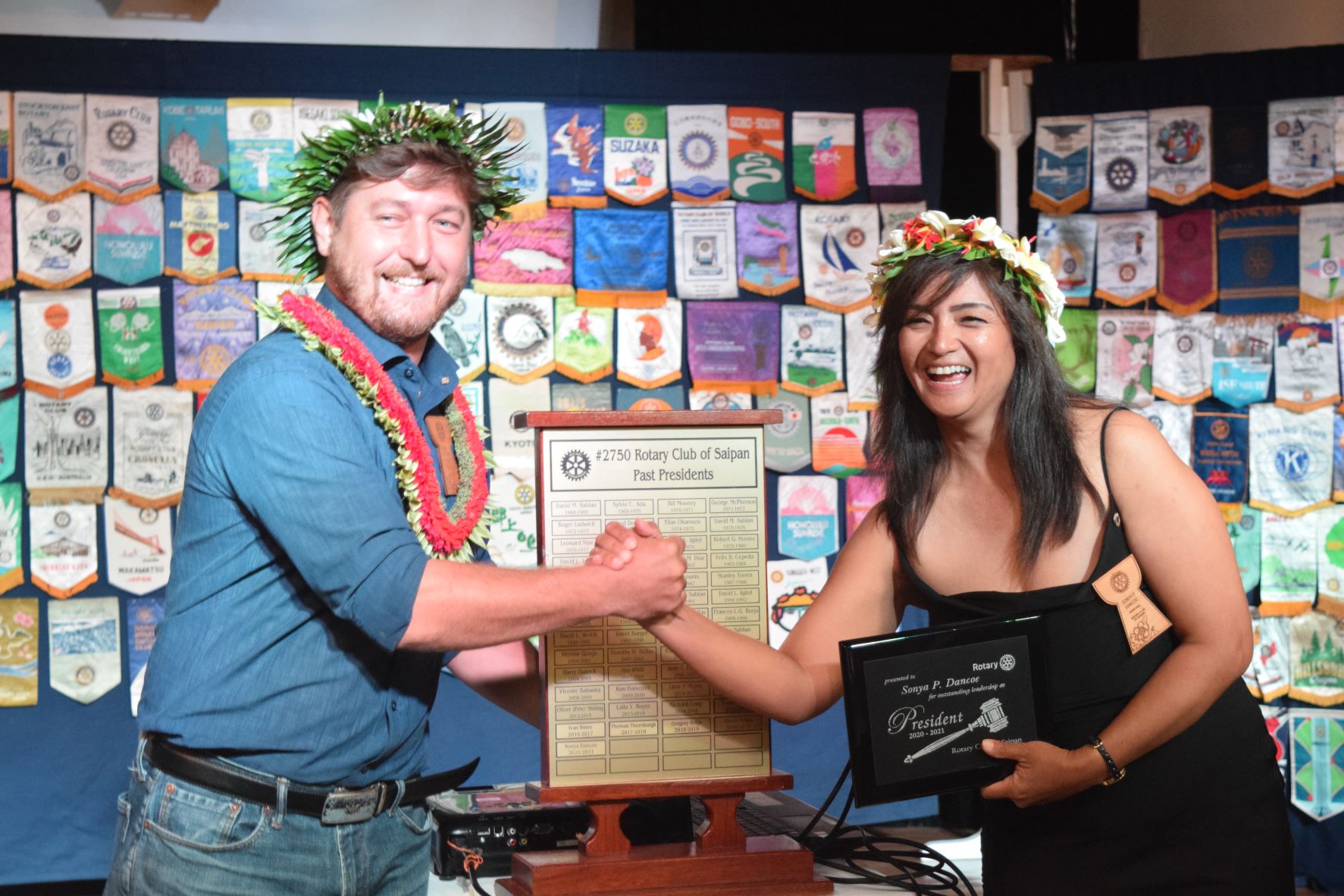 Rotary Club of Saipan’s new president Ivan Ilmov with his immediate predecessor Sonya Dancoe.