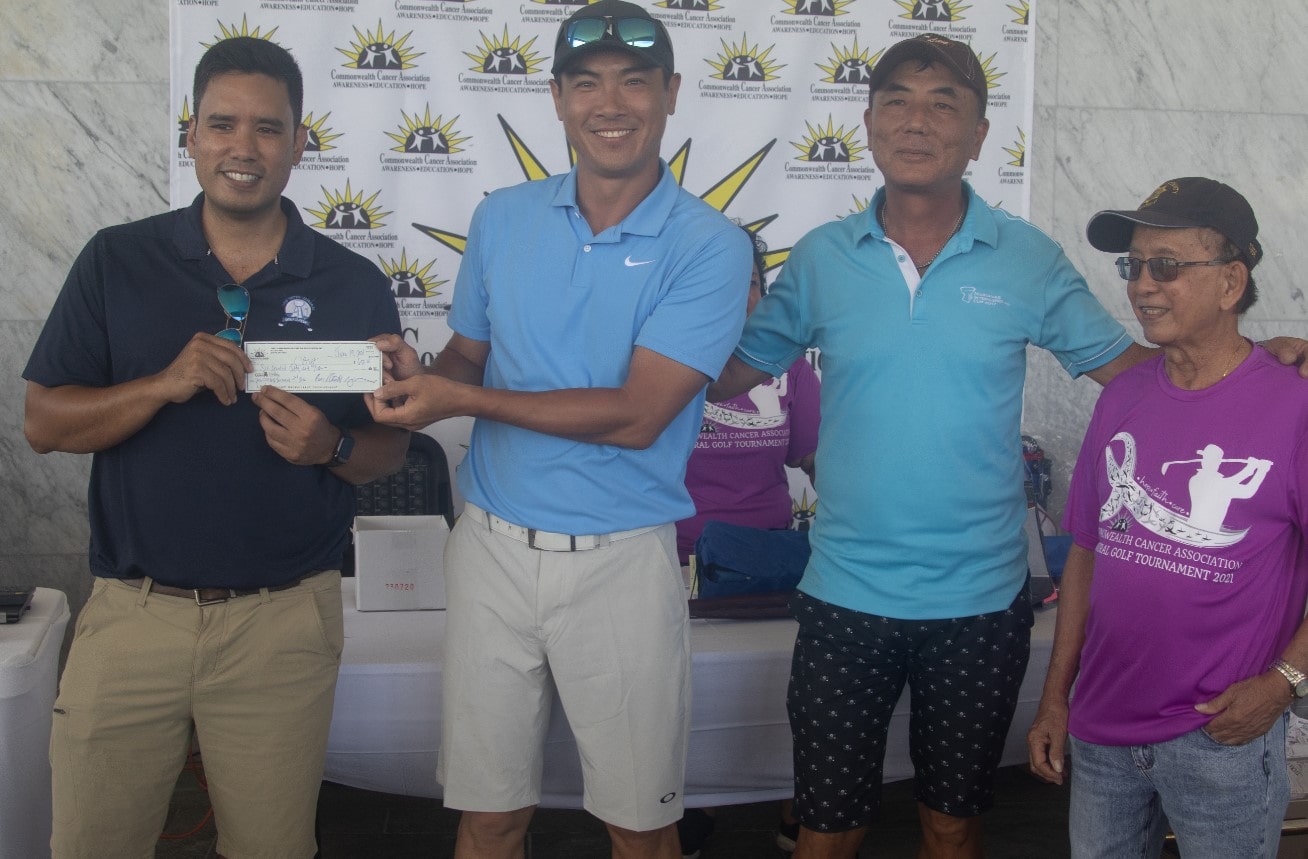 From left, Bo Palacios, CCA board president; Sun Ho Kang and Joung Hoon Park, 2nd place Low Gross Winner; Cesar Dumatol, CCA board treasurer.