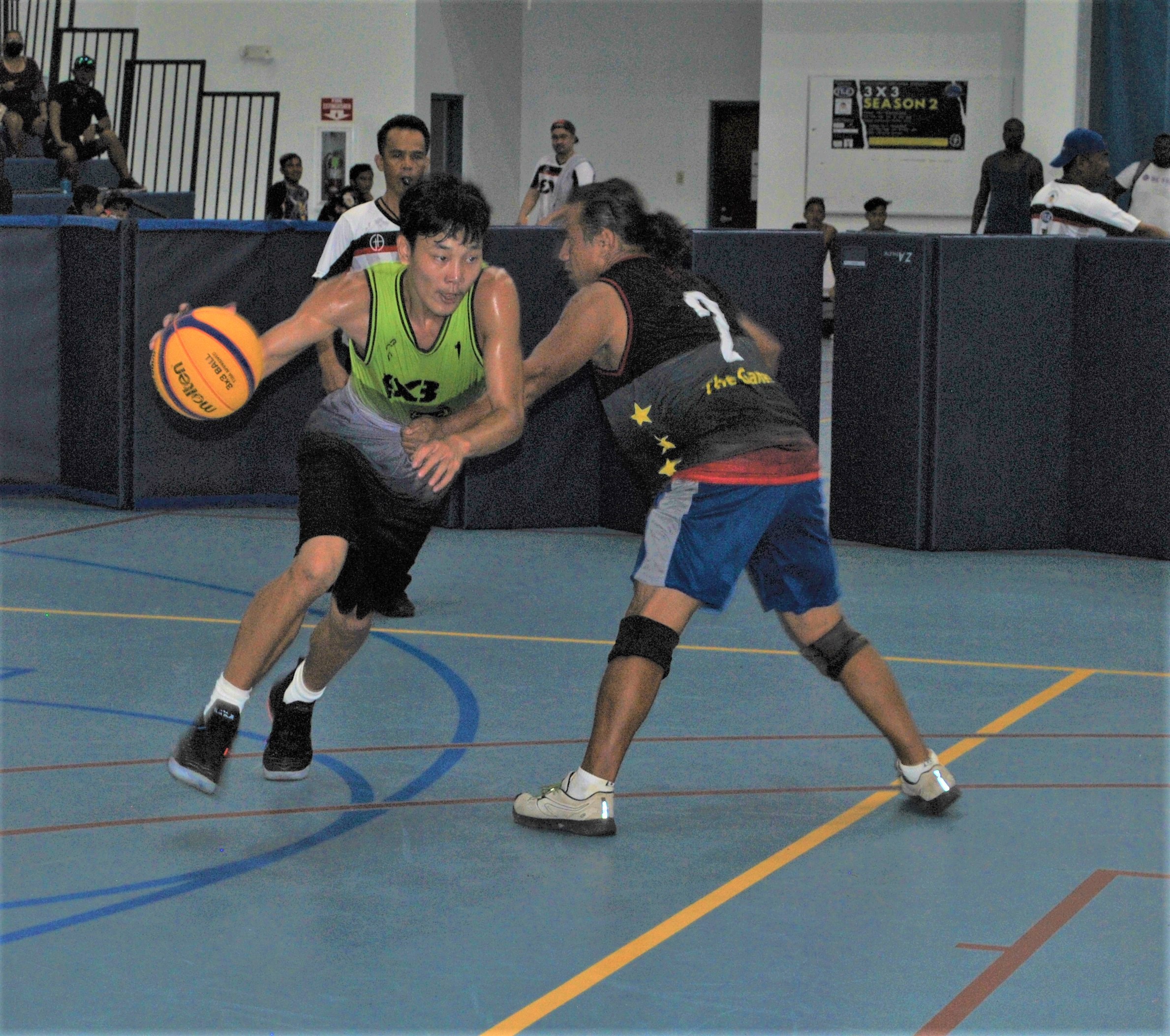 Mix Breed's Coby Santos drives past a defender.