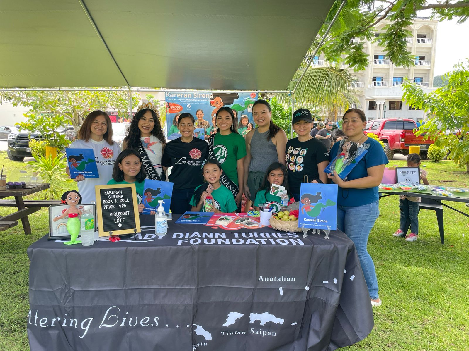 Members of the Lady Diann Torres Foundation and Stellar Marianas celebrate the book launch of "Kareran Sirena" written by young authors Ariah Villagomez, Emma Sablan, and Serenity Fujihira.