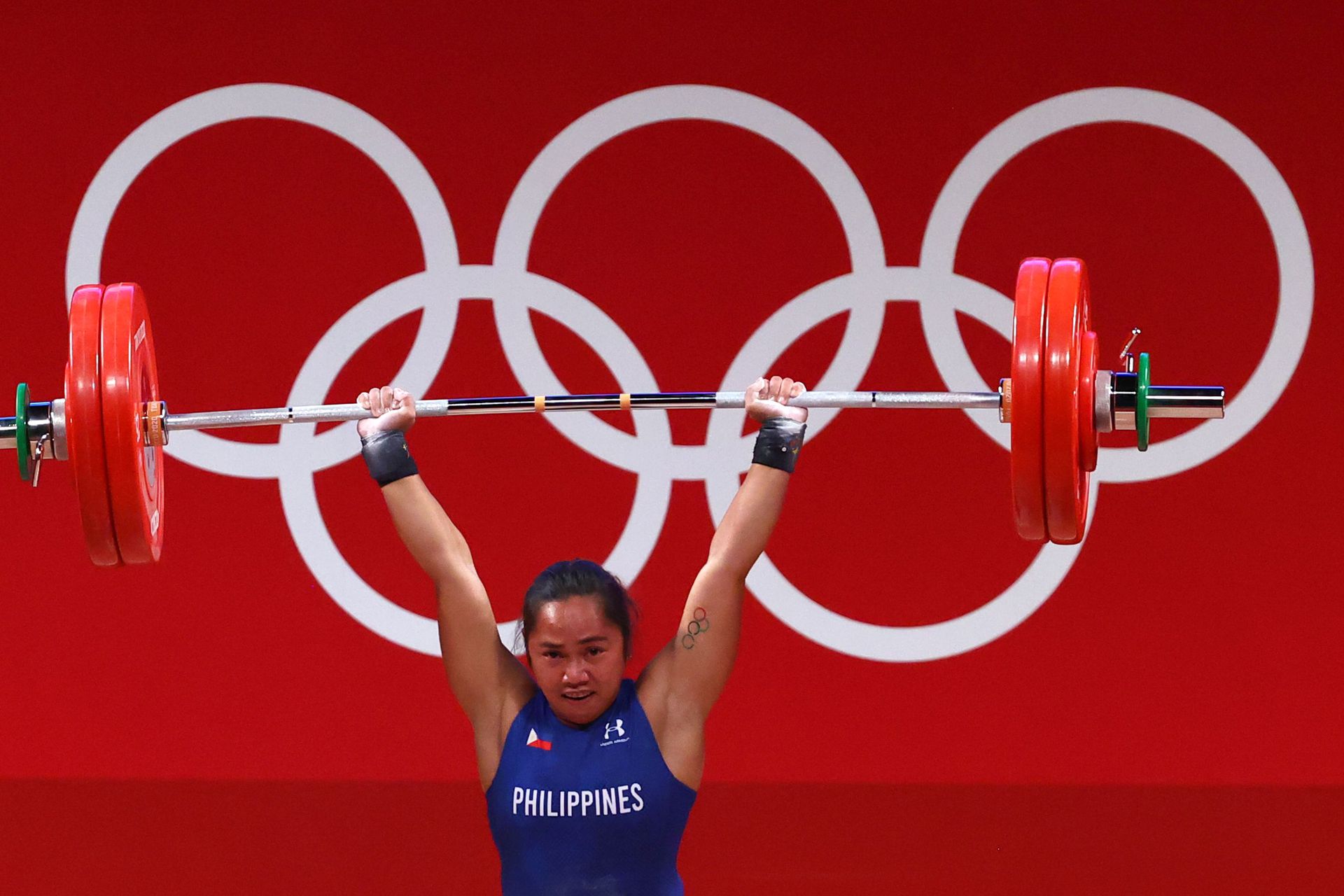 Hidilyn Diaz of the Philippines in action in Group A of the  Women's 55kg weightlifting event at the Tokyo Olympics on July 26, 2021.