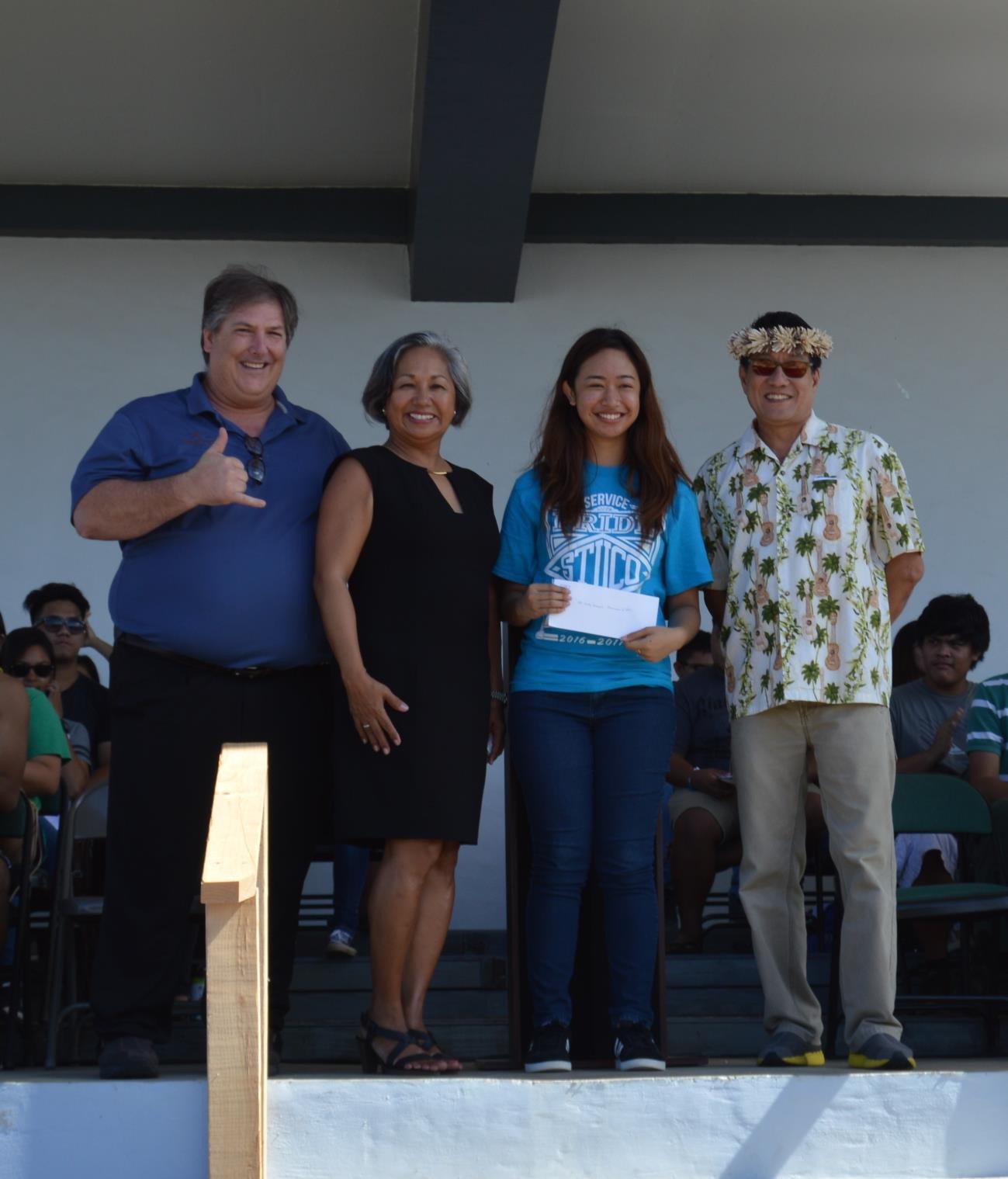 Saipan Southern High School graduate Renafe  Aniga receives the Marianas Tourism Education Council scholarship in May 2017.   Pictured from left are MTEC board member Glenn Policare, MTEC Chairwoman Vicky Benavente, Aniga, and MTEC board member Larry Lee.   MTEC will restart the scholarship program in school year 2021-2022.