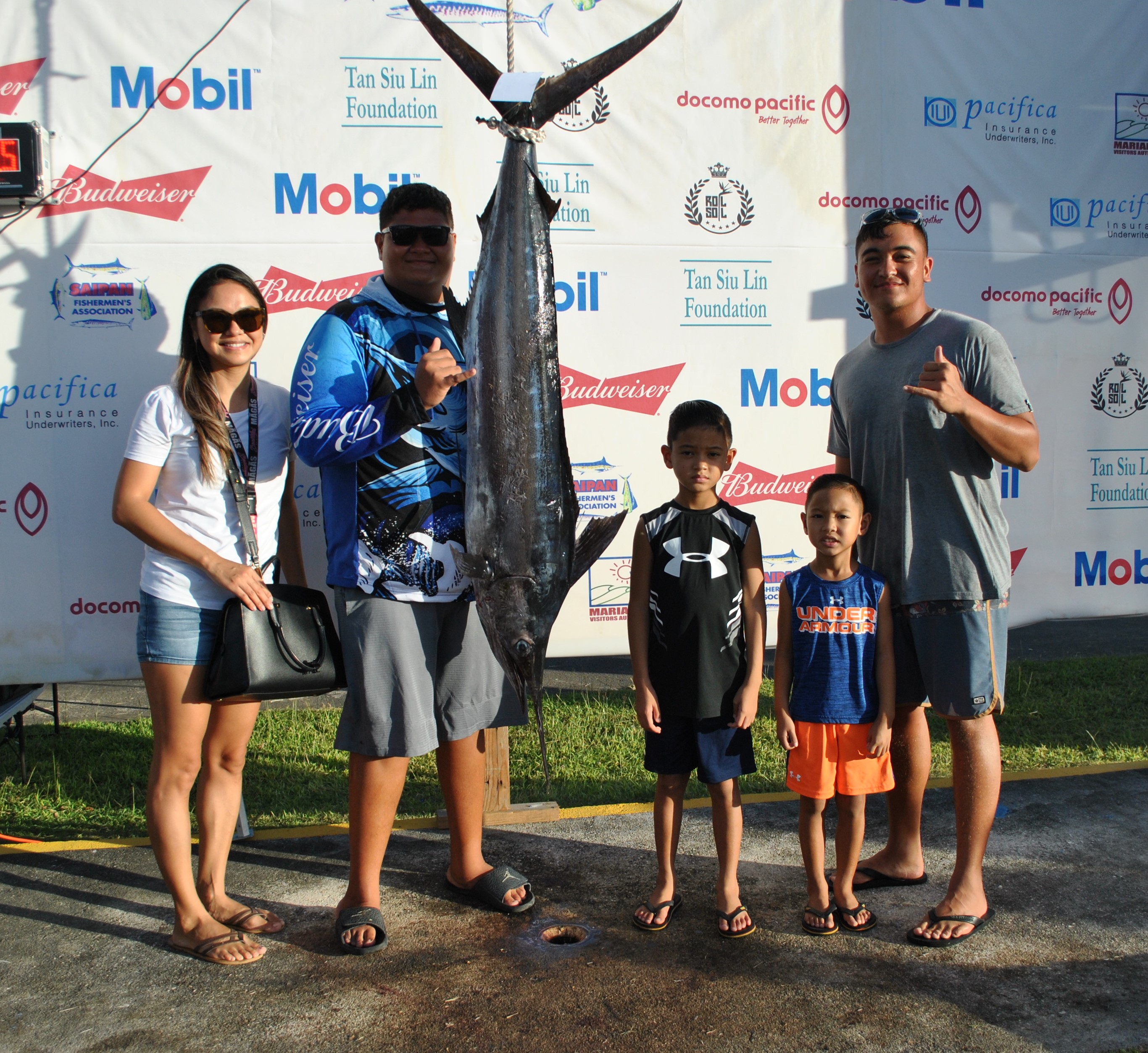 The crewmembers of MV Gloria II pose with their billfish.