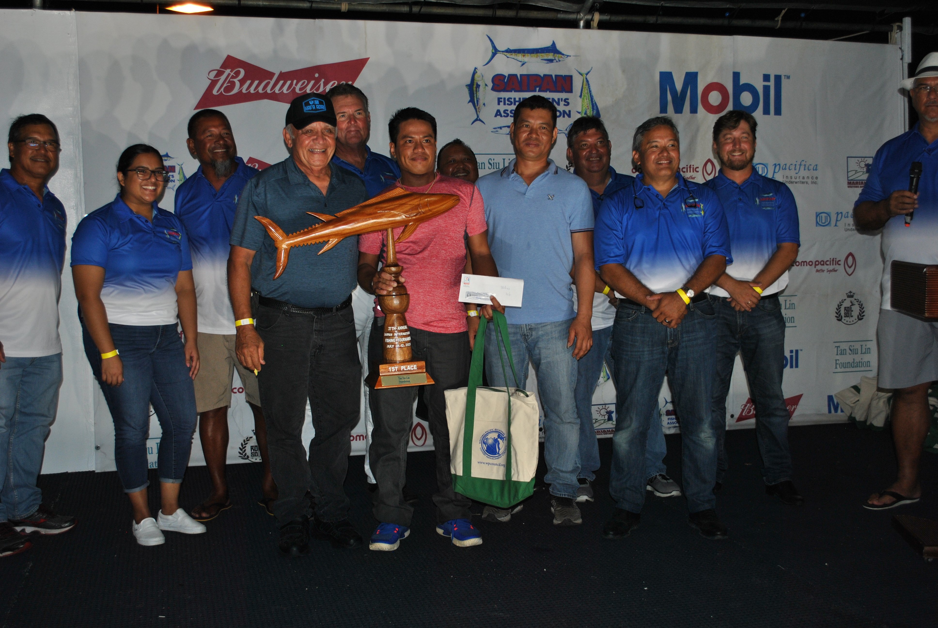 The J&MJ crewmembers with the Wahoo trophy.