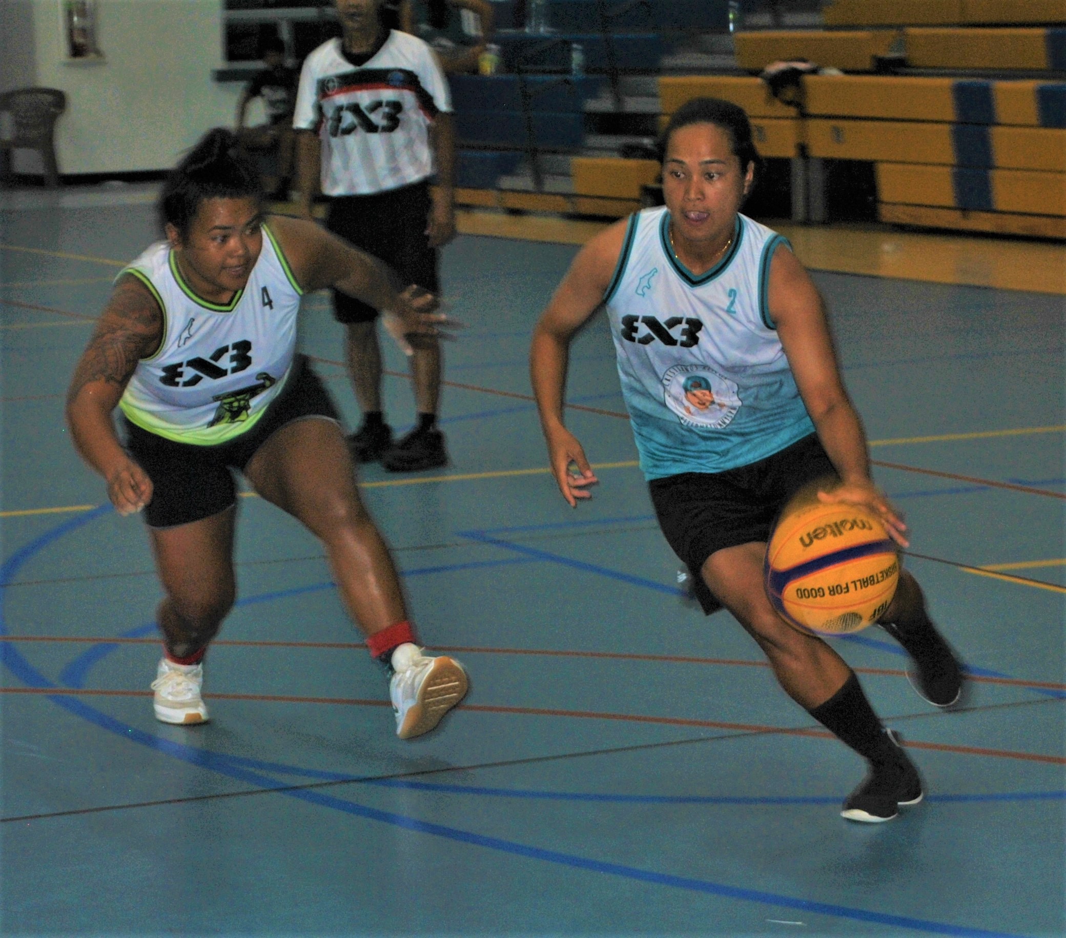 The BB Girls' Irish Pagarao drives toward the hoop.