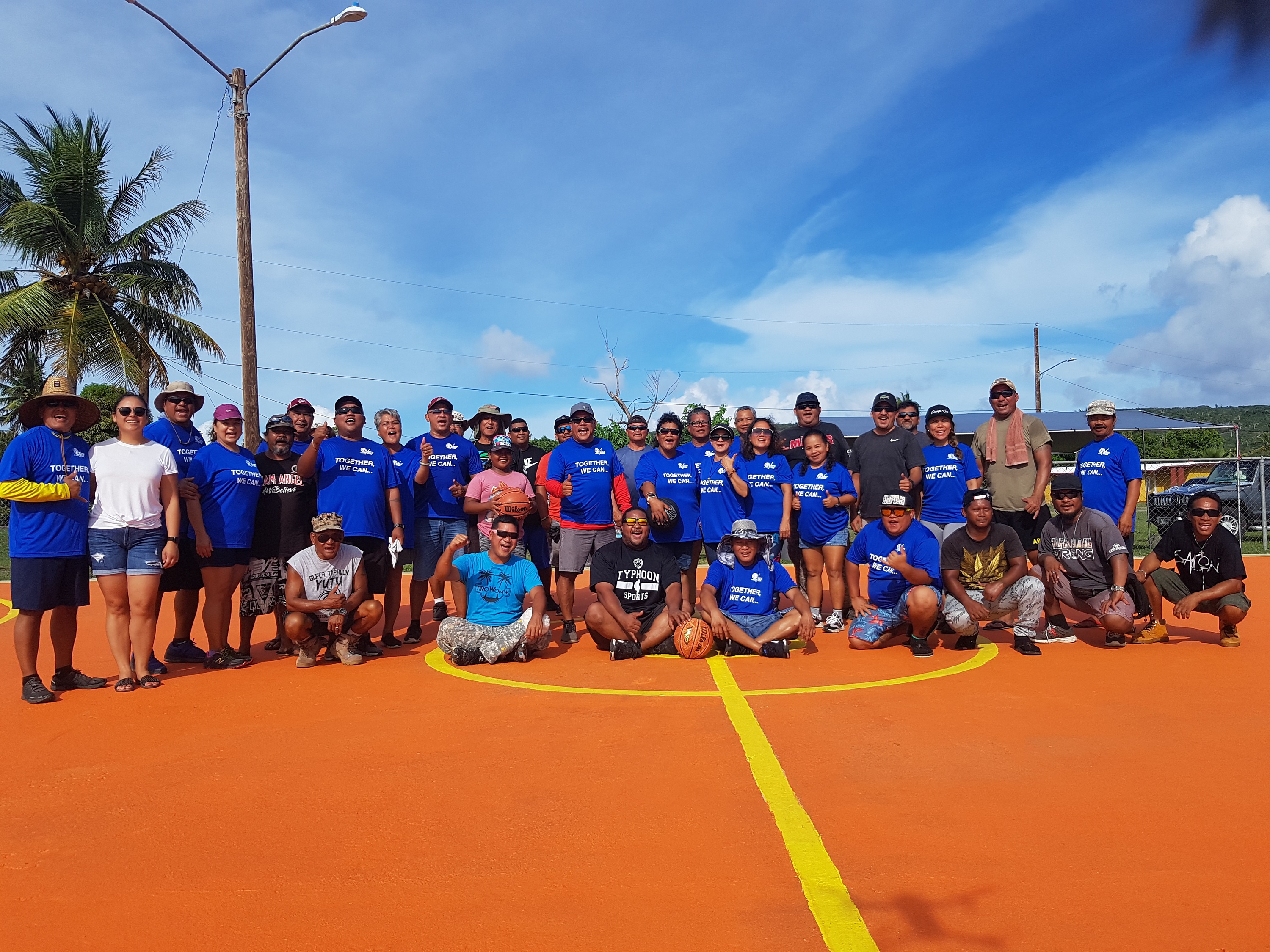 Supporters of the Public Private Partnership initiative of the Governor’s Council of Economic Advisers last weekend and volunteers from Tinian and Saipan pose for a group photo after completing the transformation project at the Broadway Estates Basketball Court last June 26.