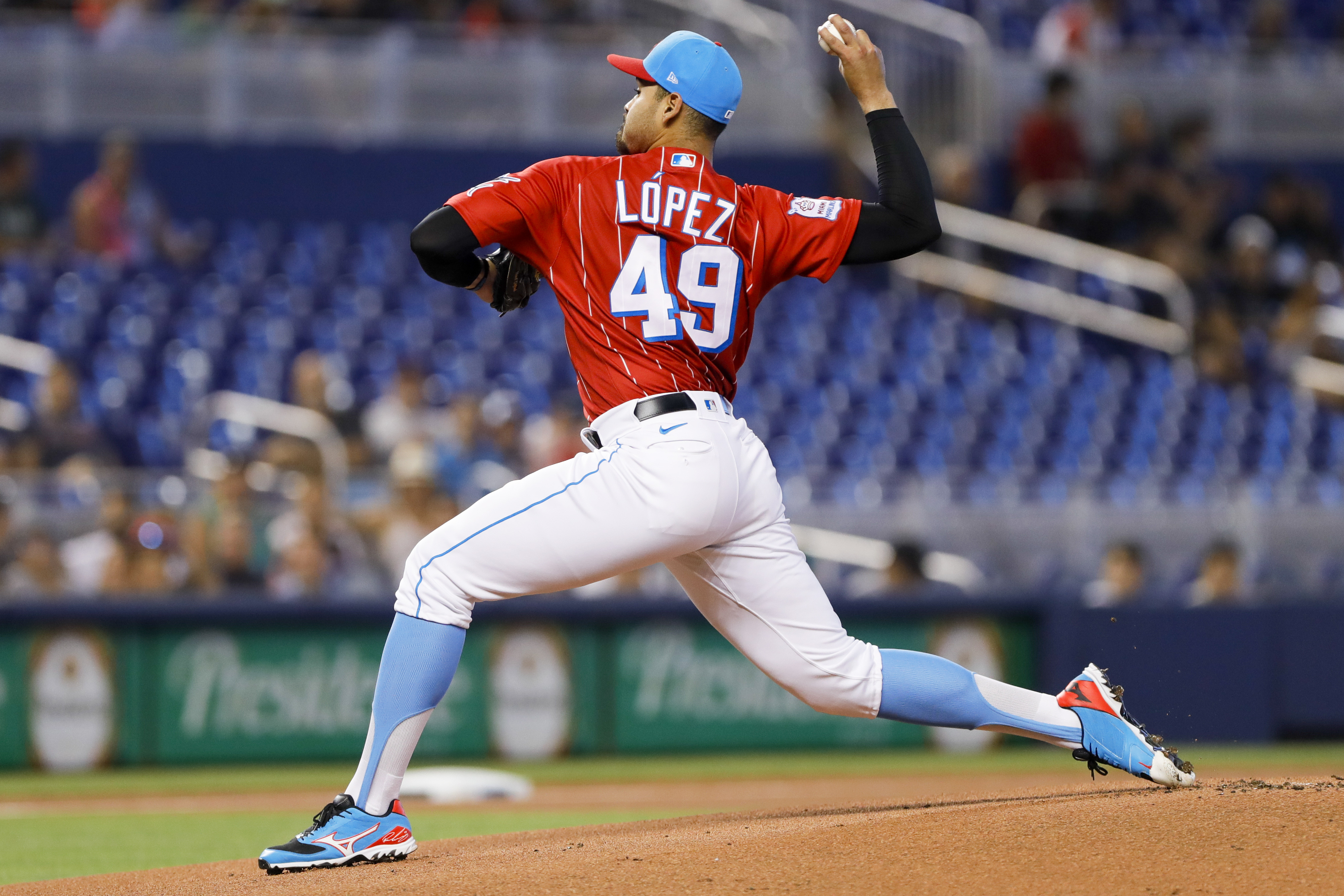 Miami Marlins starting pitcher Pablo Lopez (49) delivers a pitch during the first inning against the Atlanta Braves at LoanDepot Park in Miami, Florida.