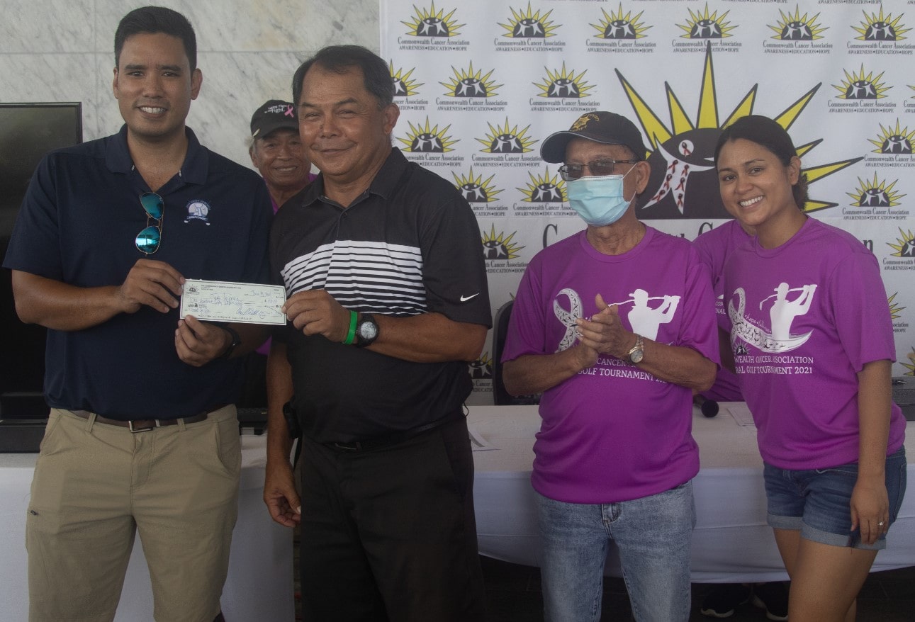 From left, Bo Palacios, CCA board president; Joe Torres,  winner, Closest to Pin on Hole #15; Cesar Dumatol, CCA board treasurer; and Nicolette V. Inos, CCA board member.