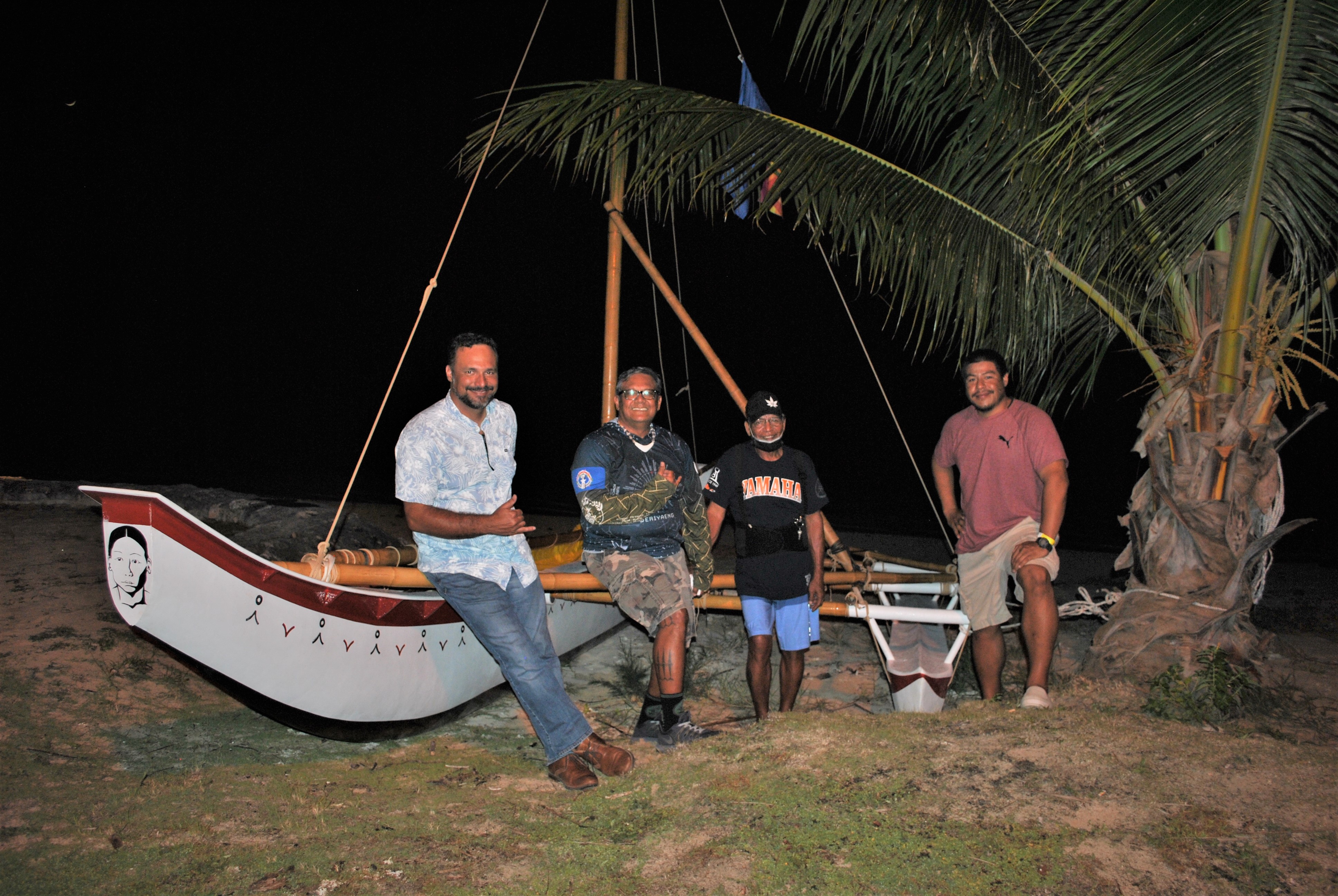 500 Sails president Arthur De Oro, second left, and his team pose with a traditional sailing canoe that participated in the recently held 37th Annual Saipan International Fishing Tournament.