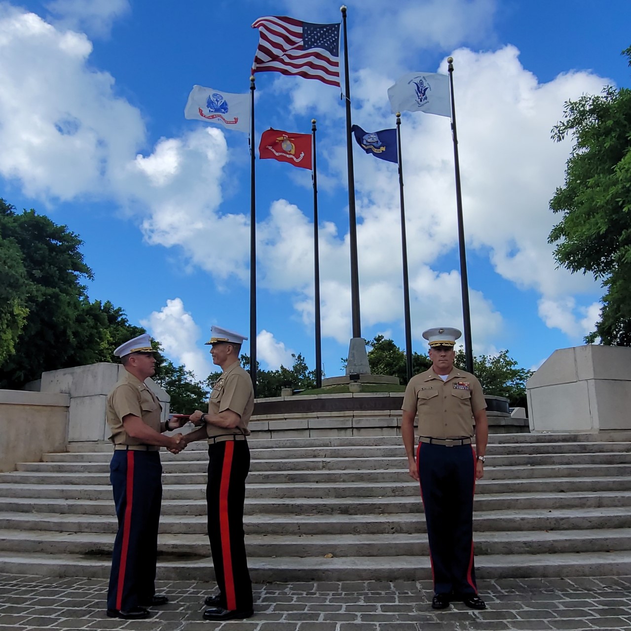 Gen. Mark Hashimoto of the Marine Pacific Command in Hawaii presents the Bronze Star Medal to Lt. Col. Albert S. Flores Jr.