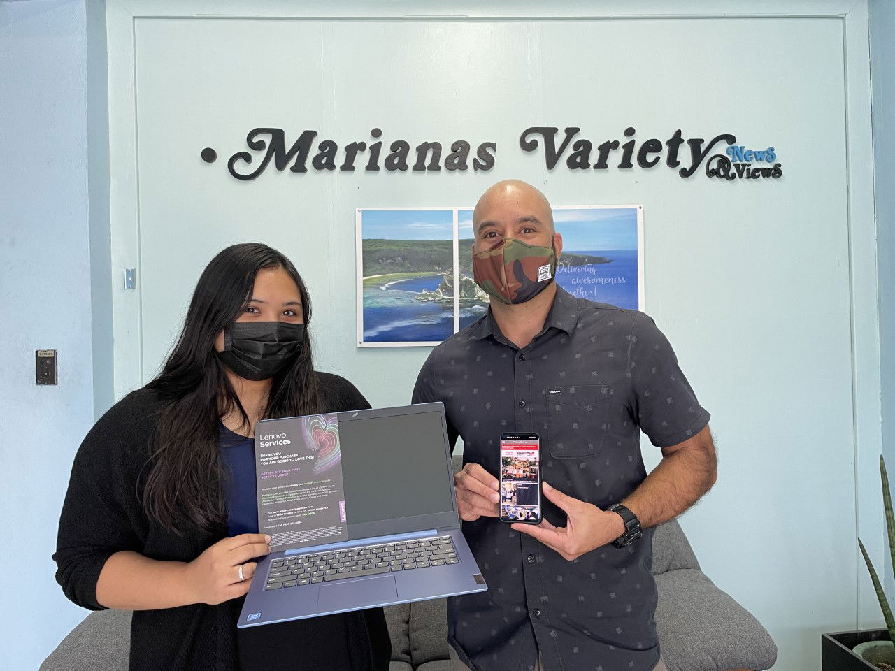 Vertilia Leon Guerrero Camacho (left) won a new Lenovo IdeaPad 14” HD Intel Pentium Silver 4GB RAM 128GB SSD Win 10 Ice Blue laptop as part of Marianas Variety's mobile app contest. She is pictured with Marianas Variety's President Amier Younis. 