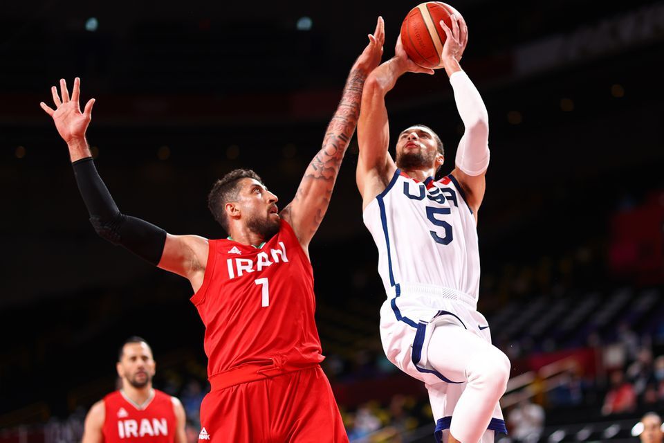 Zach Lavine of the United States in action with Mohammad Hassanzadeh of Iran at the Saitama Super Arena in Saitama, Japan on July 28, 2021.