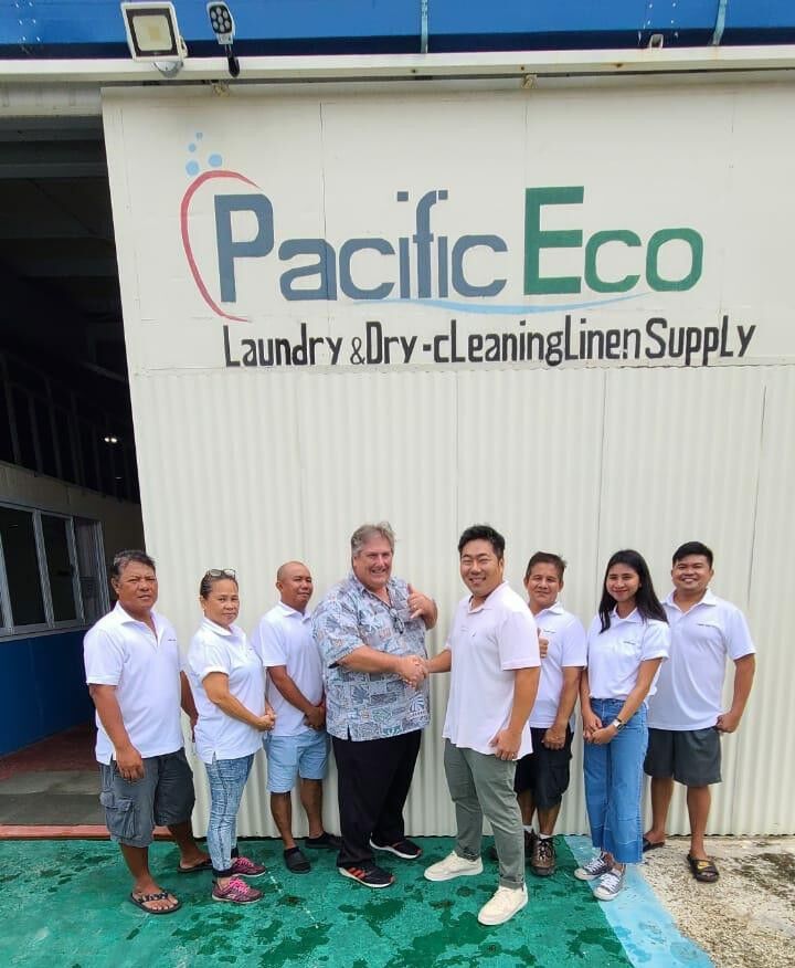 Fourth right, operations manager Jun Park of Pacific Eco Laundry is joined by staff and management in Afetna, Saipan, on July 23, 2021, in signing up as a Deluxe Sponsor for the 19th Annual HANMI Charity Classic Golf Tournament.  From left, Danilo Asunto, Riza Puyat, Andy Apao, golf tournament committee chairman Glenn Policare, Park, Lorenzo Dalawampu, Cecile Trinanez, and Ferry Jay Danipog.