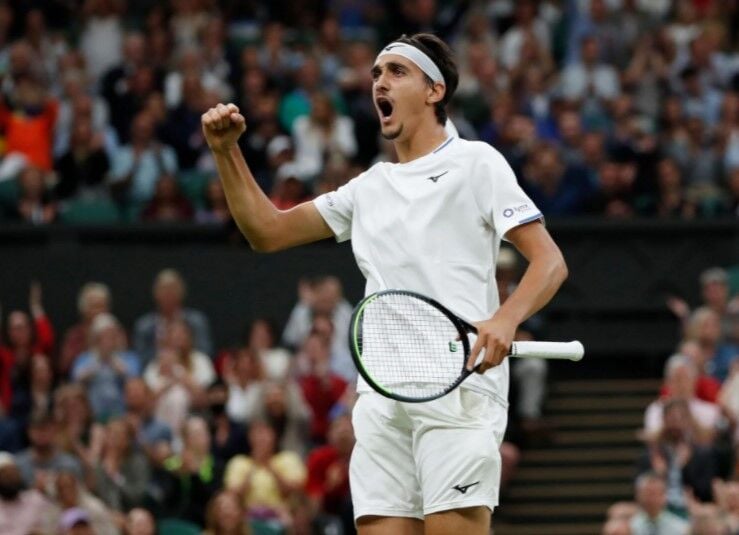 Italy's Lorenzo Sonego reacts during his fourth round match against Switzerland's Roger Federer at Wimbledon in London, Britain on July 5, 2021.