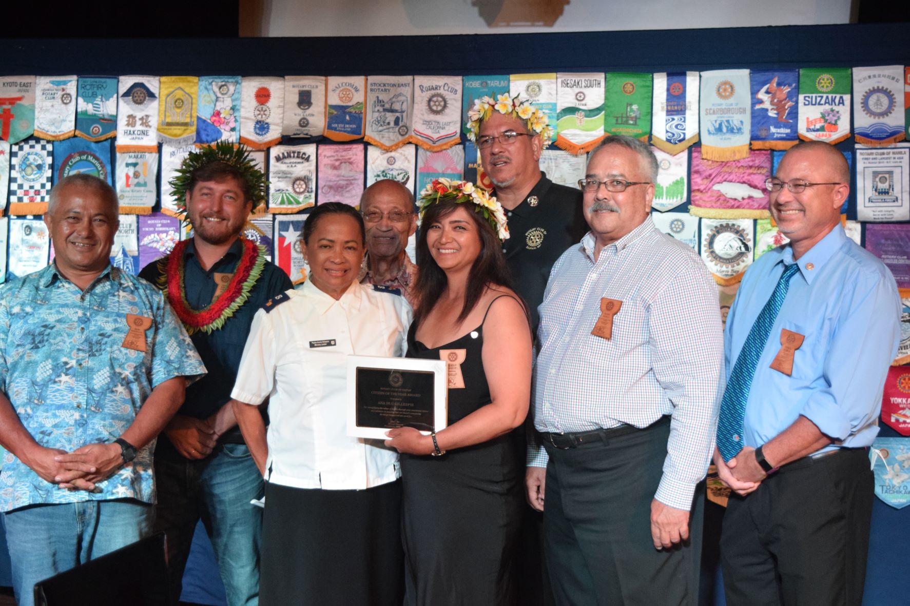 The Salvation Army's Anna Deleon Guerrero Gillespie, third left,  is the Rotary Club’s Citizen of the Year. With here are club past president Ben Babauta, new president Ivan Ilmov, Gillespie, past president Dave Sablan, outgoing president Sonya Dancoe, outgoing sergeant-at-arms and past president Curtis Dancoe, double past president Glen Perez and past president Gregory Pat Borja.