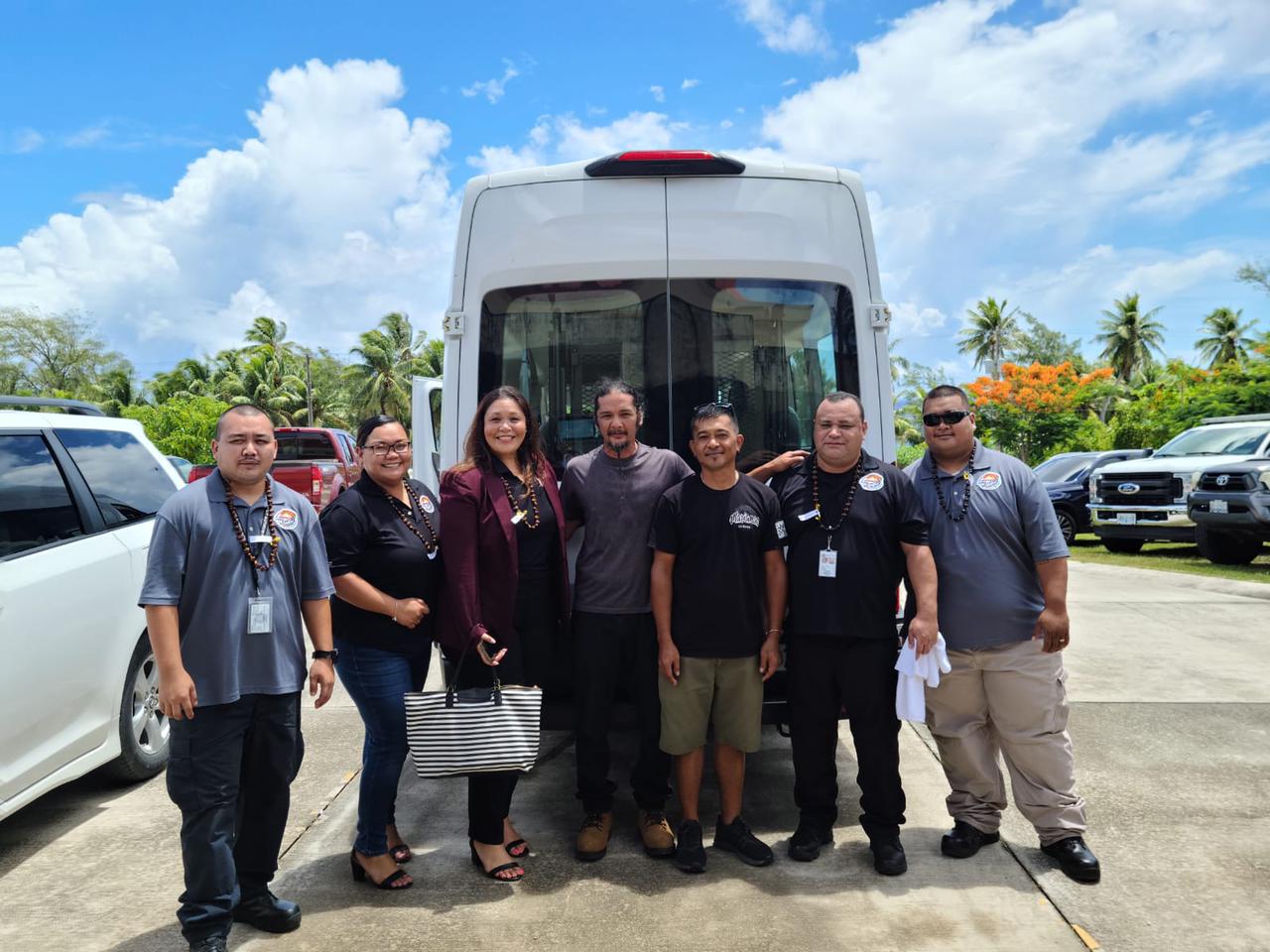Special Assistant for Public Transportation Alfreda C. Maratita poses in front of the COTA van for Rota with members of her staff and Rota disability network partners.