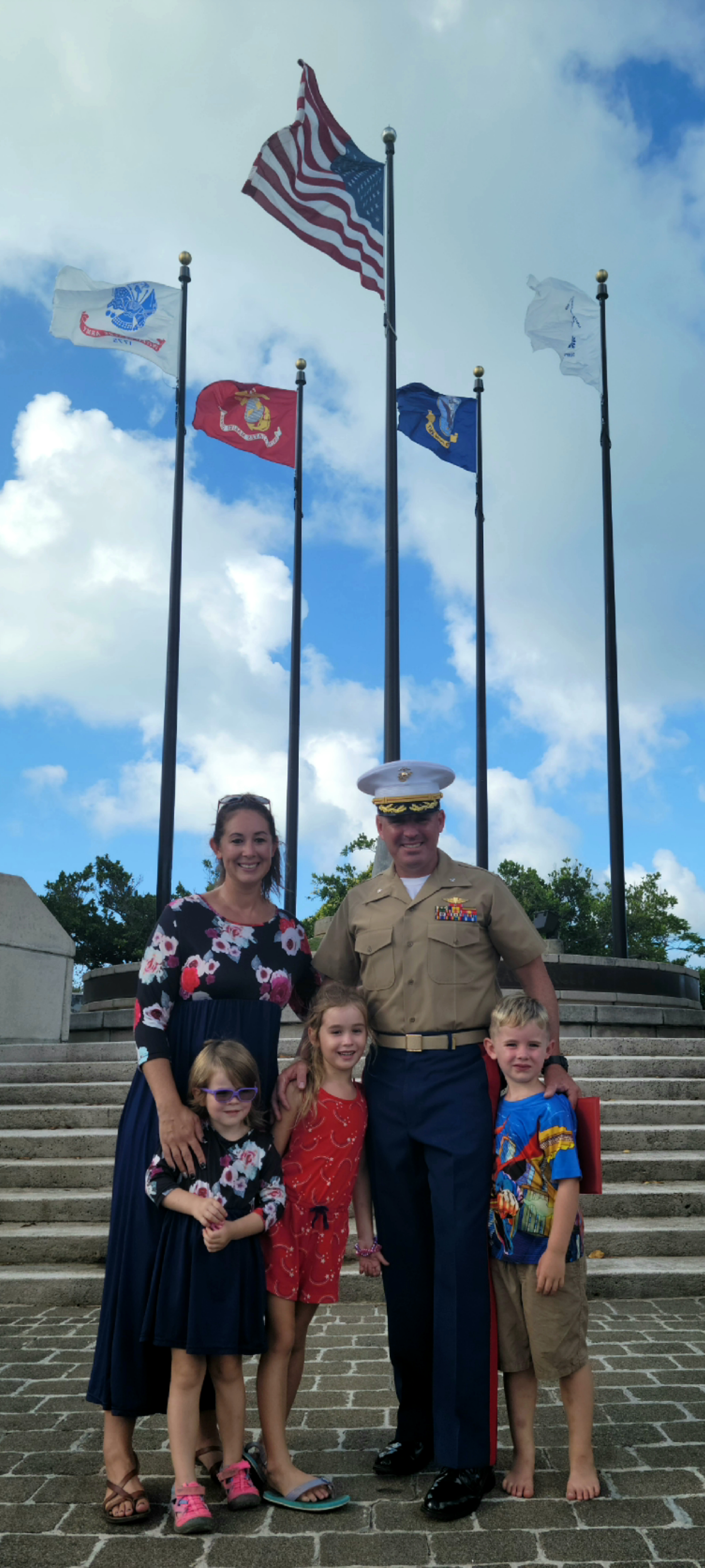 Lt. Col. Albert S. Flores Jr., his wife Doemiko, and their three children, Miriam, Thomas, and Scarlett.
