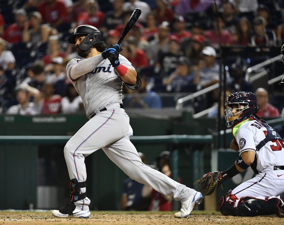 Miami Marlins catcher Jorge Alfaro (38) hits an RBI double against the Washington Nationals during the tenth inning at Nationals Park in Washington, D.C. on July 21, 2021.