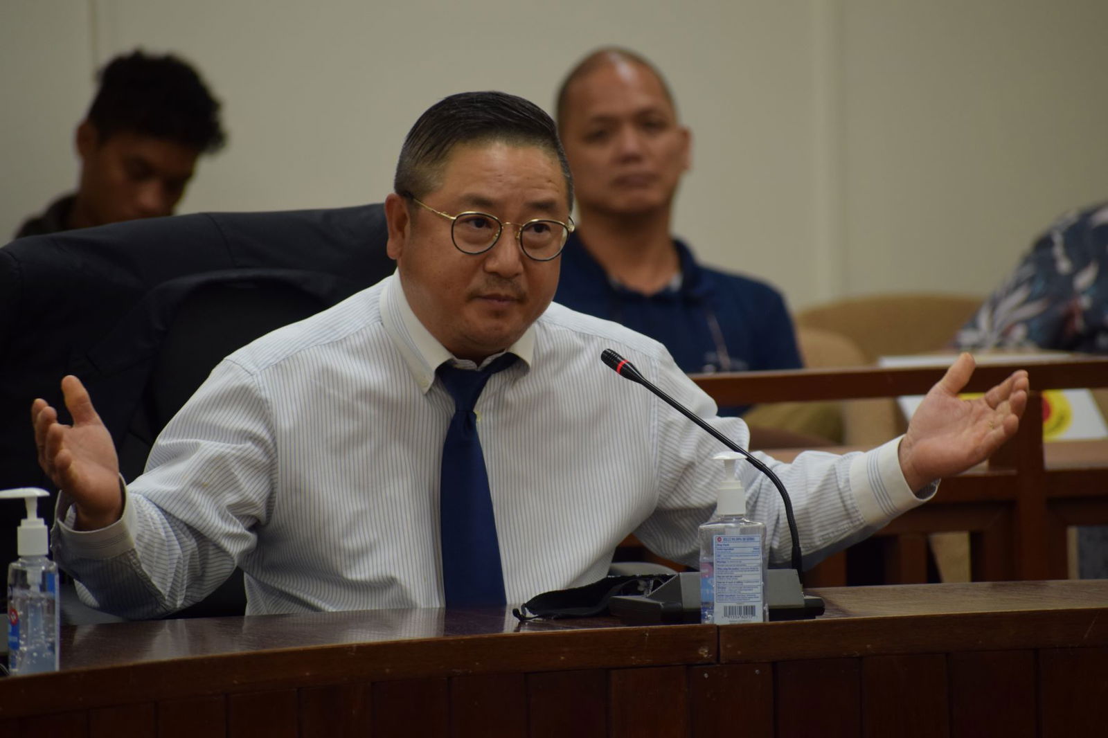 Commonwealth Casino Commission Executive Director Andrew Yeom gestures as he answers a question from the House Gaming Committee during a meeting on Thursday in the House chamber.