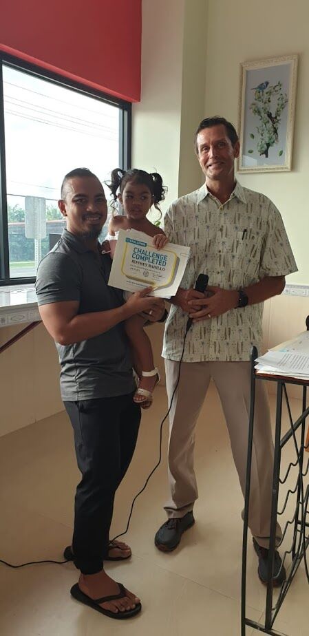 Male (30-49) first place winner Jeffrey Bahillo with daughter and Gold’s Gym general manager Tyce Mister. 