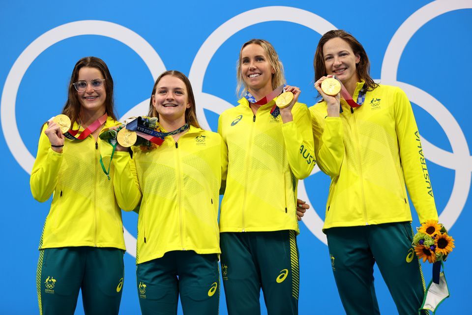 At the women's 4 x 100m medley relay medal ceremony of the Tokyo Olympics: Cate Campbell, Emma McKeon, Chelsea Hodges and Kaylee McKeown of Australia celebrate with their gold medals on Aug. 1, 2021.