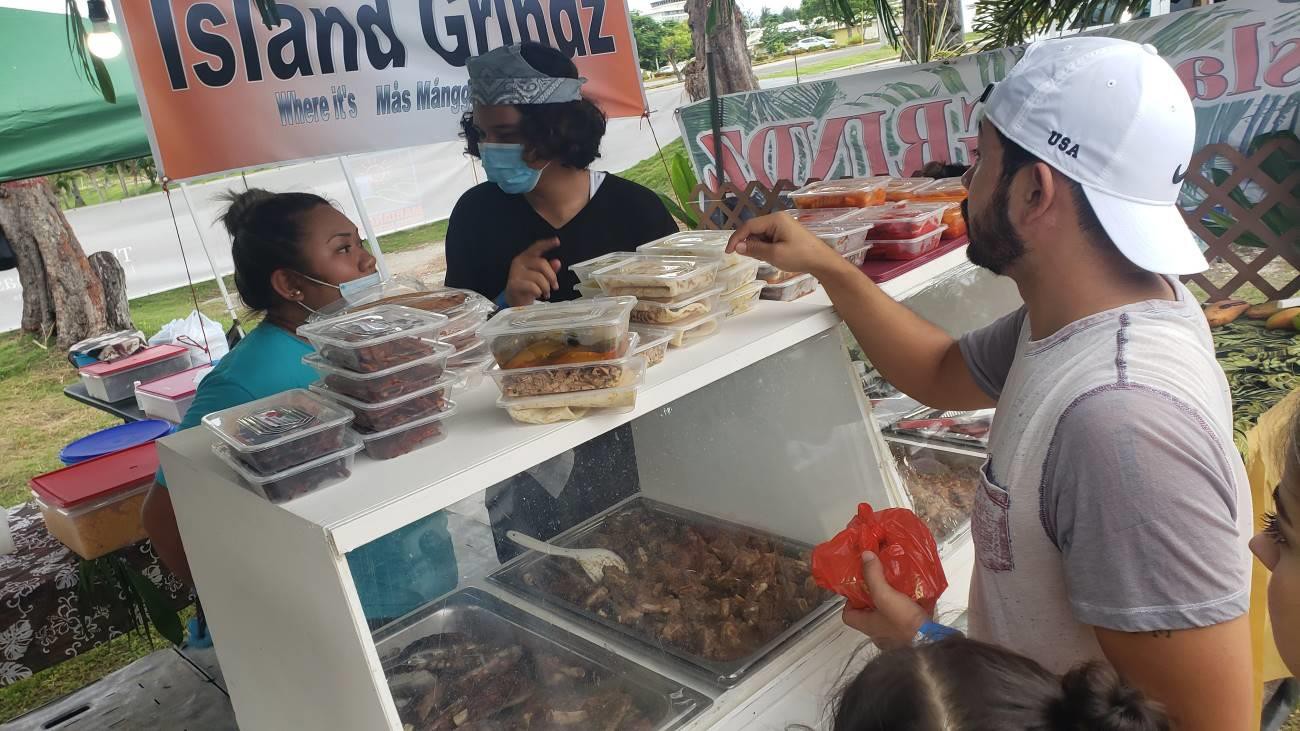 Island Grindz serves festivalgoers at the Marianas Visitors Authority’s Hafa Adai & Tirow Summer Jam on July 31, 2021.