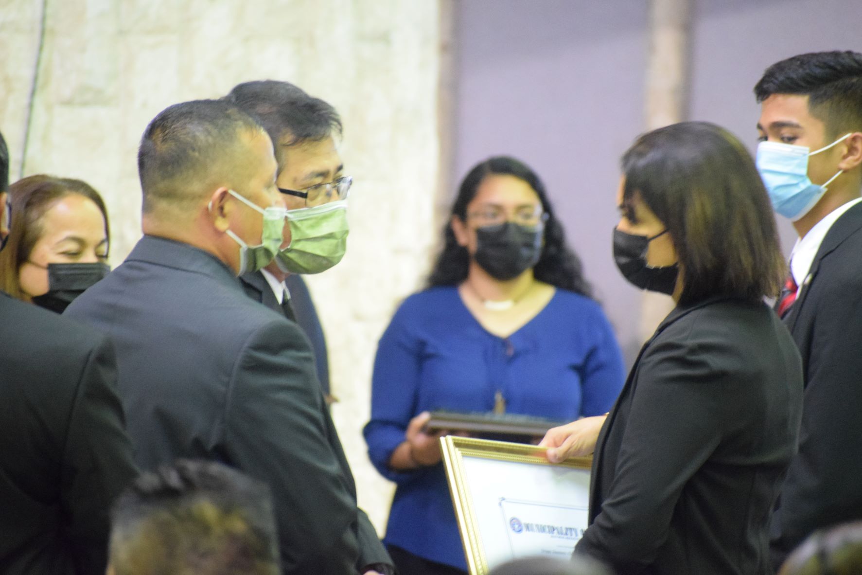 Rota Mayor Efraim Atalig presents a tribute to the family of Rep. Ivan Blanco.