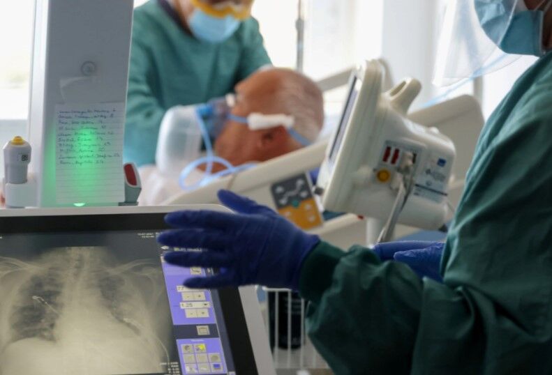 Hospital staff do an X-ray of the lung of a patient suffering from the coronavirus disease at Hospital del Mar, where an additional ward has been opened to deal with an increase in coronavirus patients in Barcelona, Spain on July 15, 2021. 