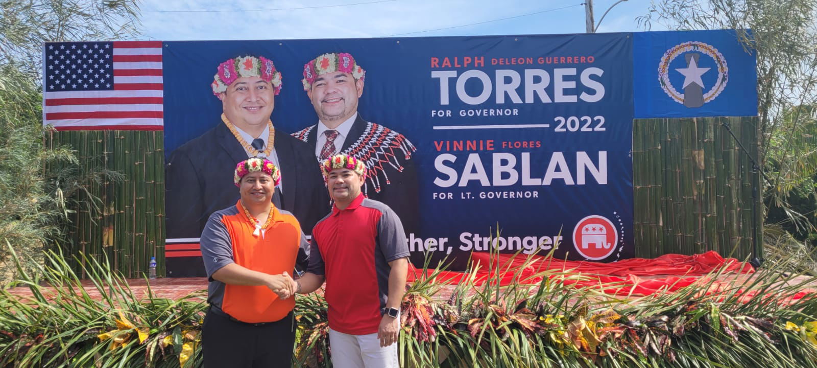Gov. Ralph DLG Torres and running-mate Senate Floor Leader Vinnie F. Sablan shake hands as they pose for a photo at the governor's residence in As Teo, Sunday.