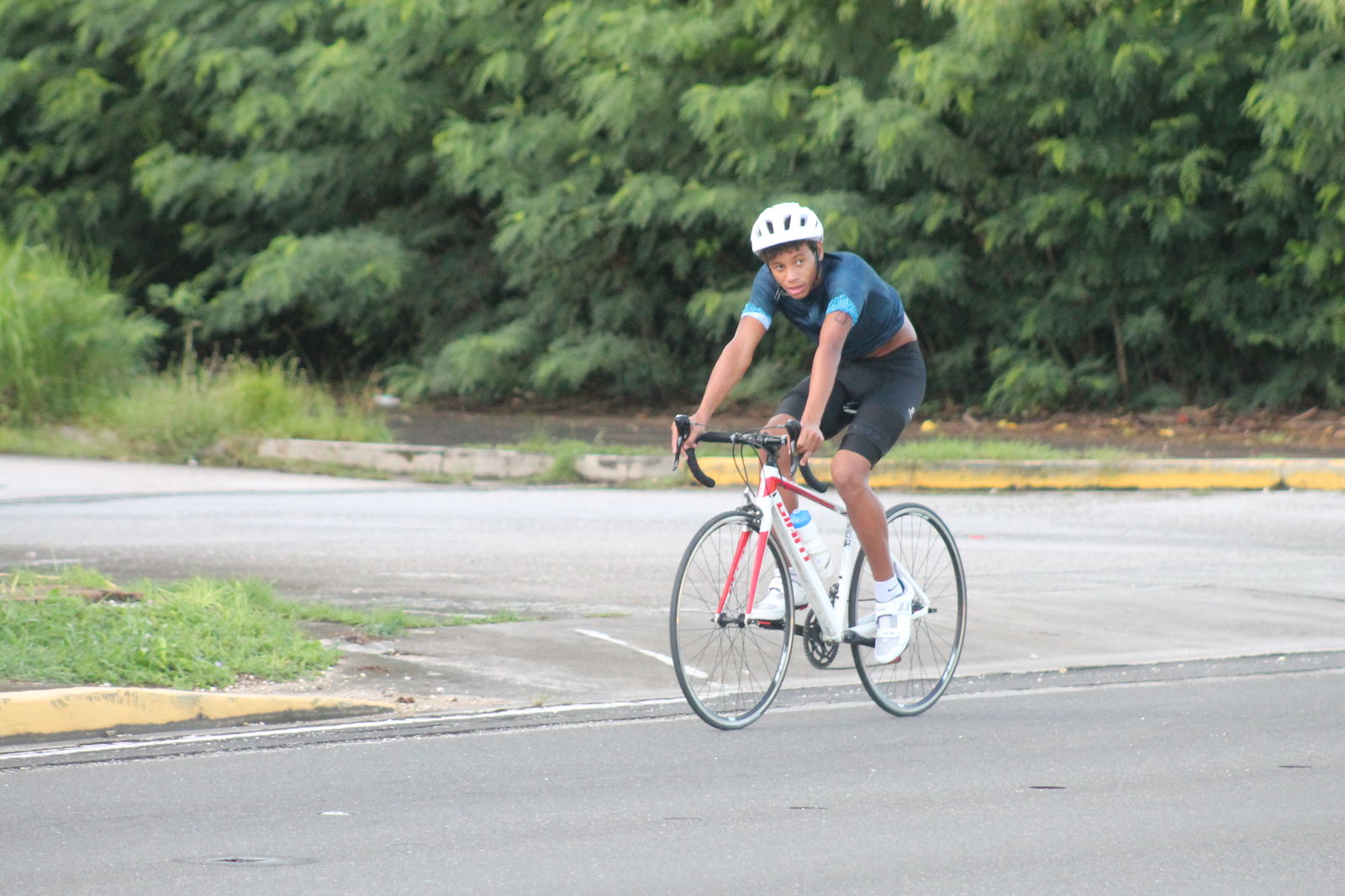 Isaiah Aleksenko looks on as he completes half of the bike leg.