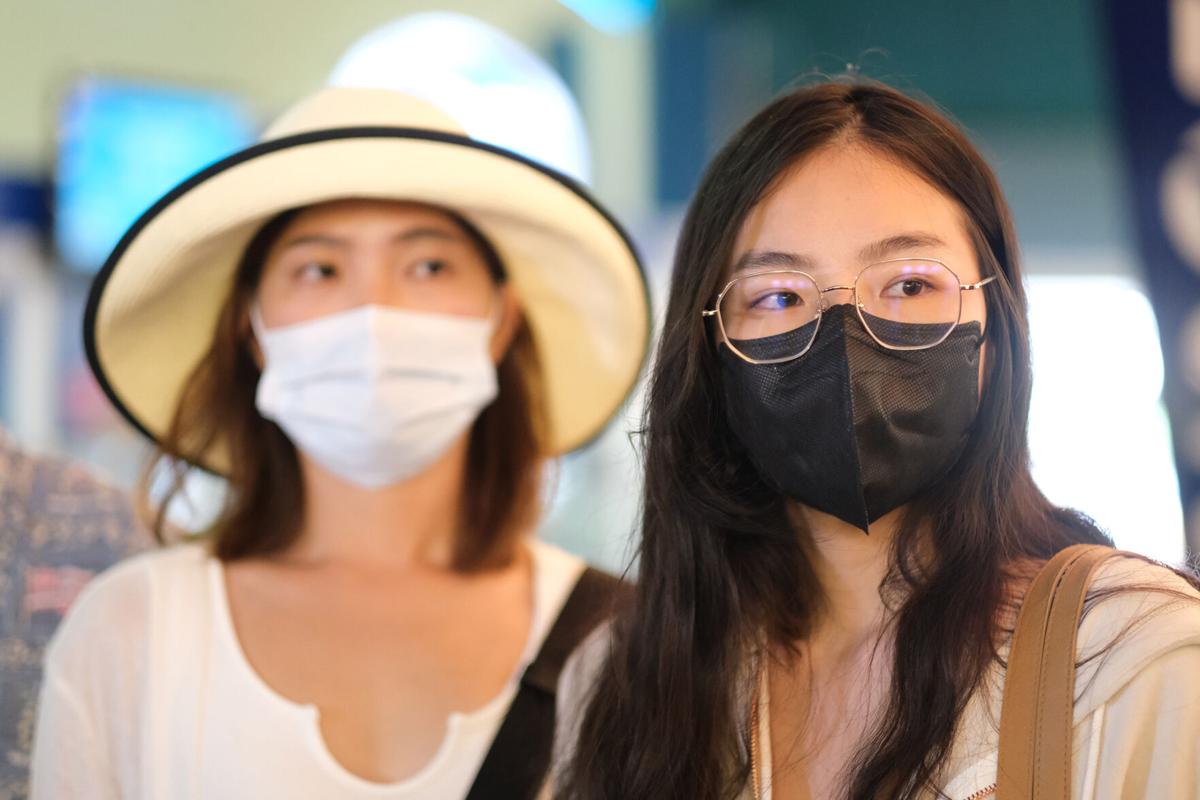 May Tu, right, a tourist from Taiwan, was trying on clothes at Ross Dress for Less in Tamuning when she misplaced a $12,000 bracelet. Store employees found the bracelet and returned it to her.