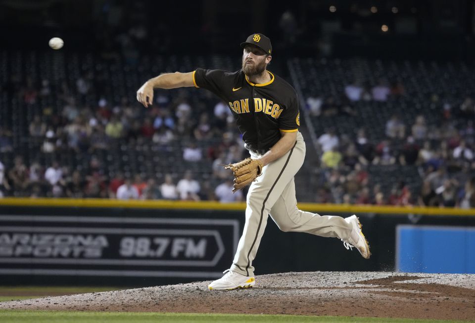 San Diego Padres relief pitcher Austin Adams (54) throws against the Arizona Diamondbacks in the ninth inning at Chase Field in Phoenix, Arizona on Aug 15, 2021.