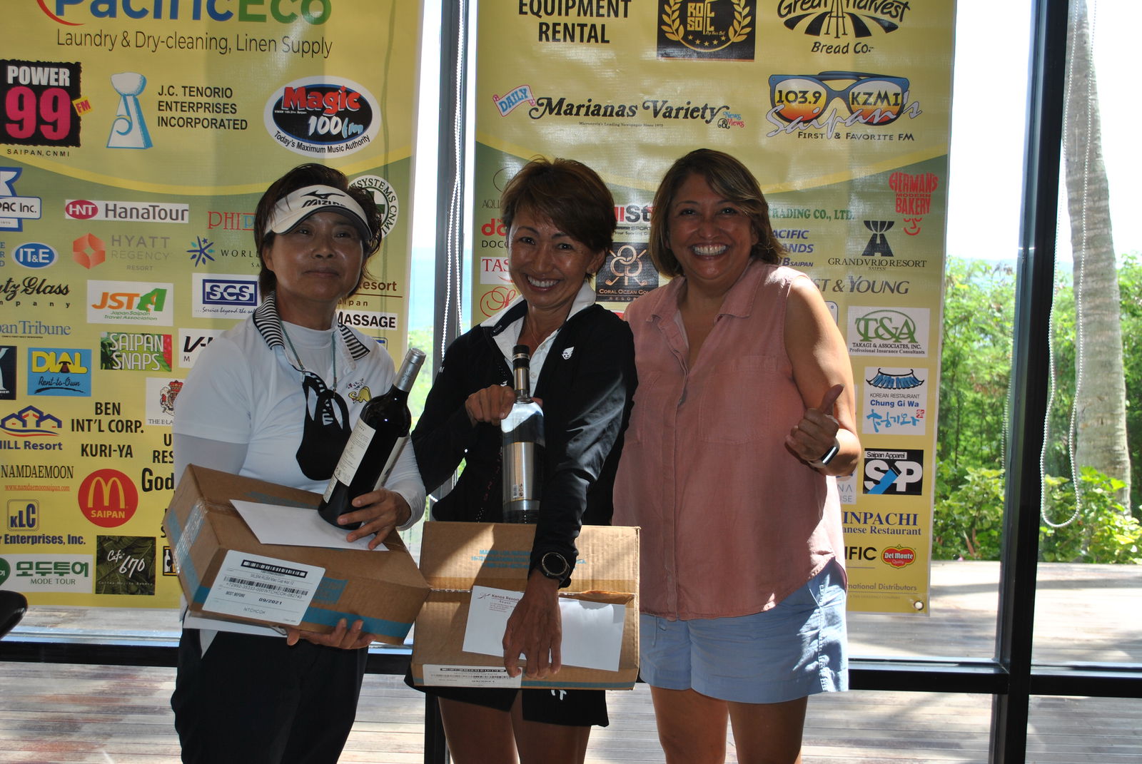 Younghee Yoo, Yuko Togawa and HANMI Chairwoman Gloria Cavanagh pose during the awards ceremony of the 19th HANMI Charity Golf Tournament  on Saturday  at  Coral Ocean Golf Resort.