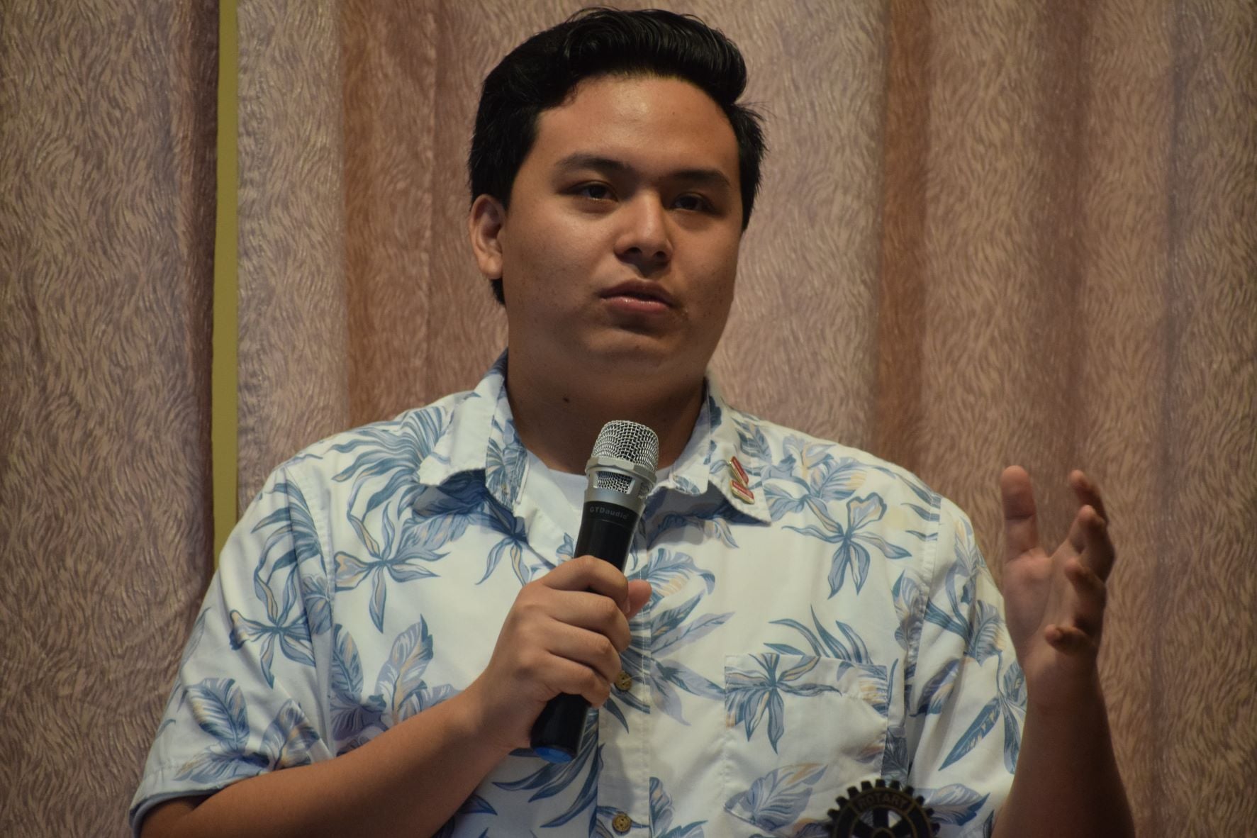 Newly installed Rotaract Club of Saipan president Richard Baleares delivers his remarks.