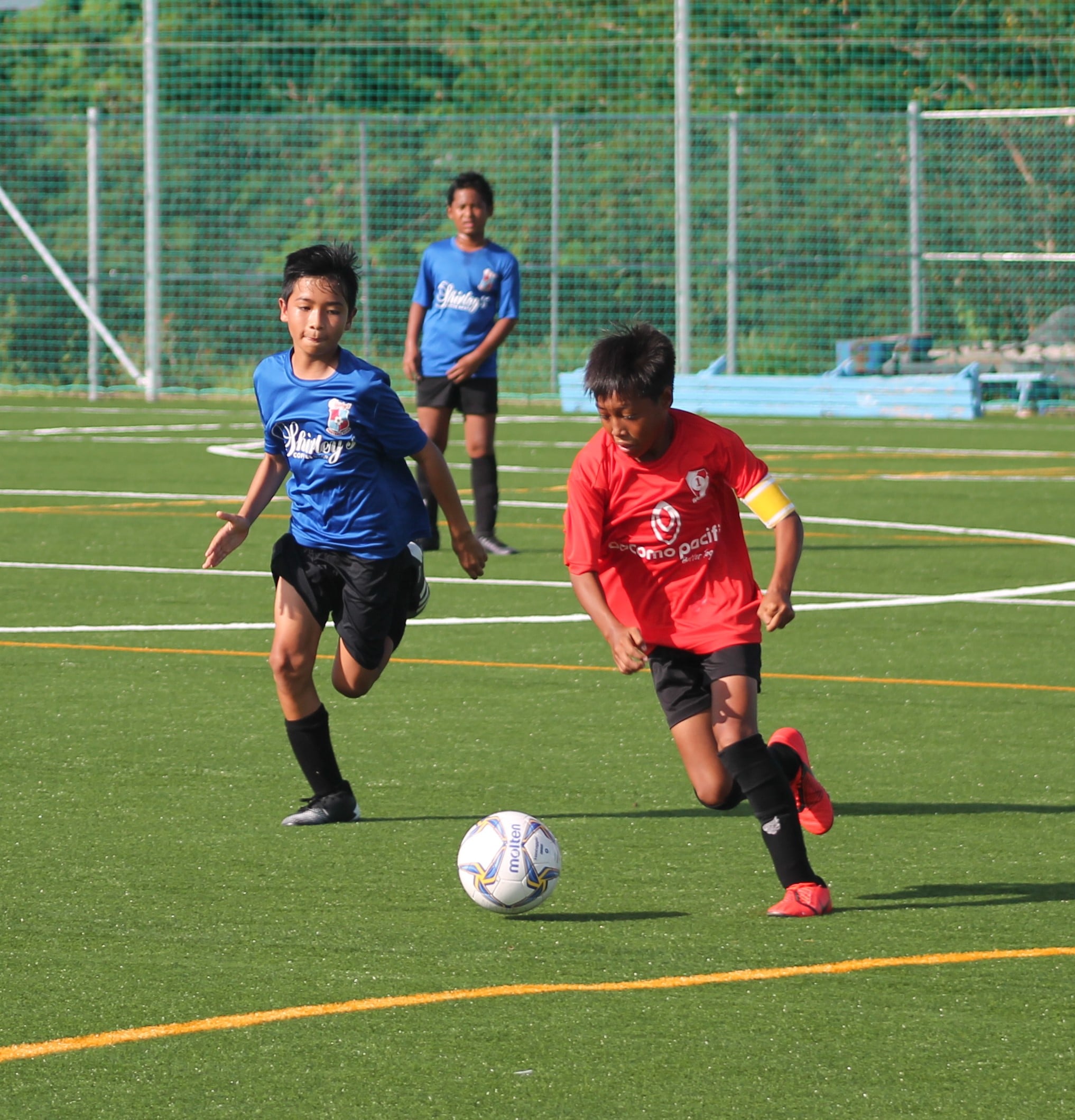 Paire’s Rodney Tomei battles for the possession during the U12 Coed Division championship game of the Youth League Summer 2021 at the NMI Soccer Training Center on Saturday.