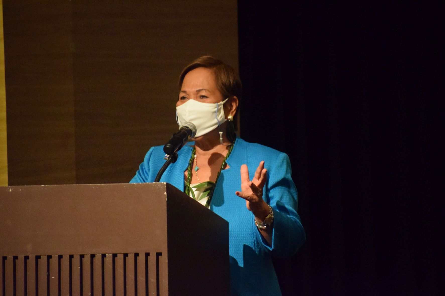 Guam Marianas Training Center Chief Executive Officer Fe Ovalles delivers her remarks during the completion ceremony for the certified nursing assistant summer program at Saipan World Resort on Sunday.